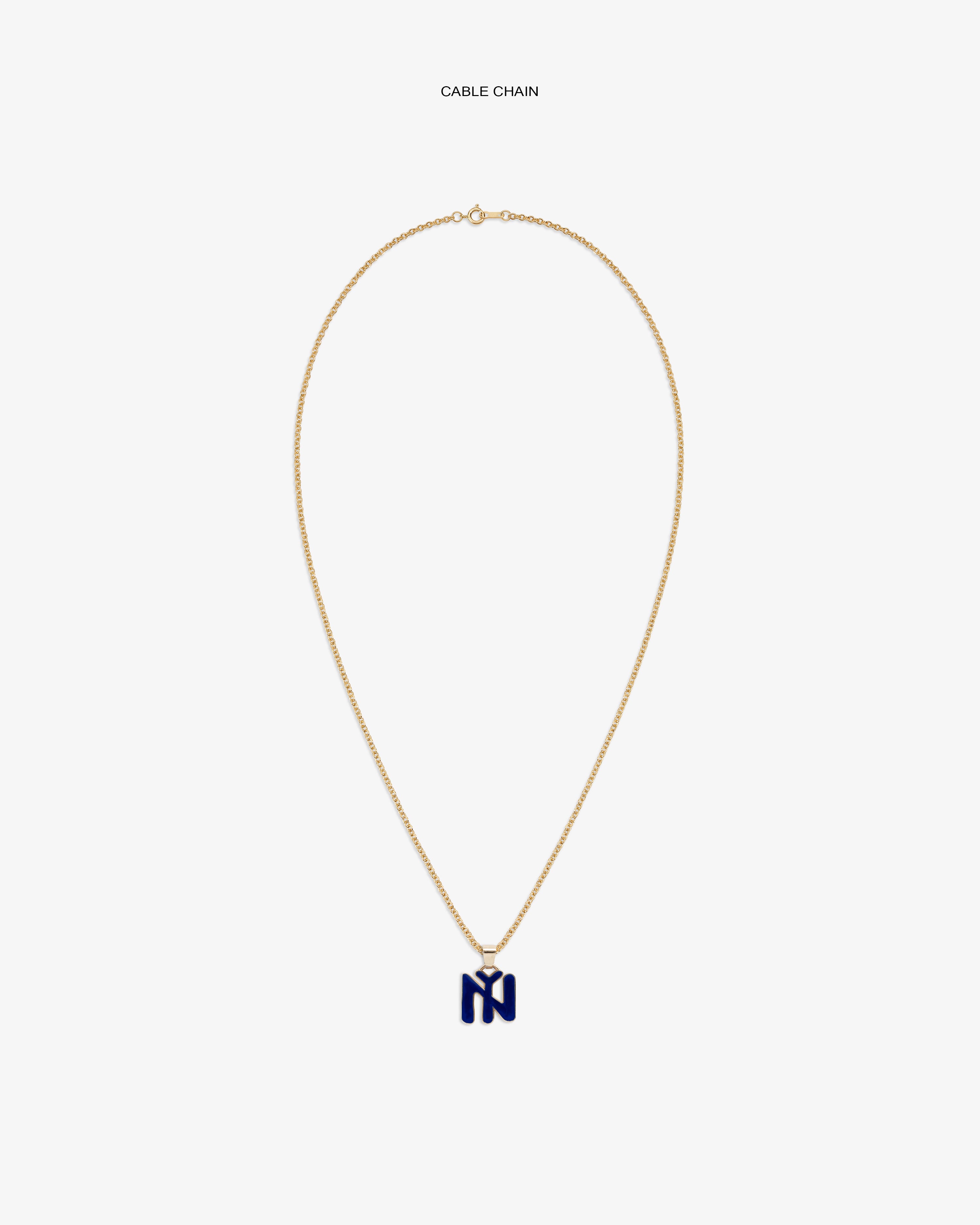 14Kt Gold Pendant: gold cable chain necklace with dark blue letter M charm on a white background.