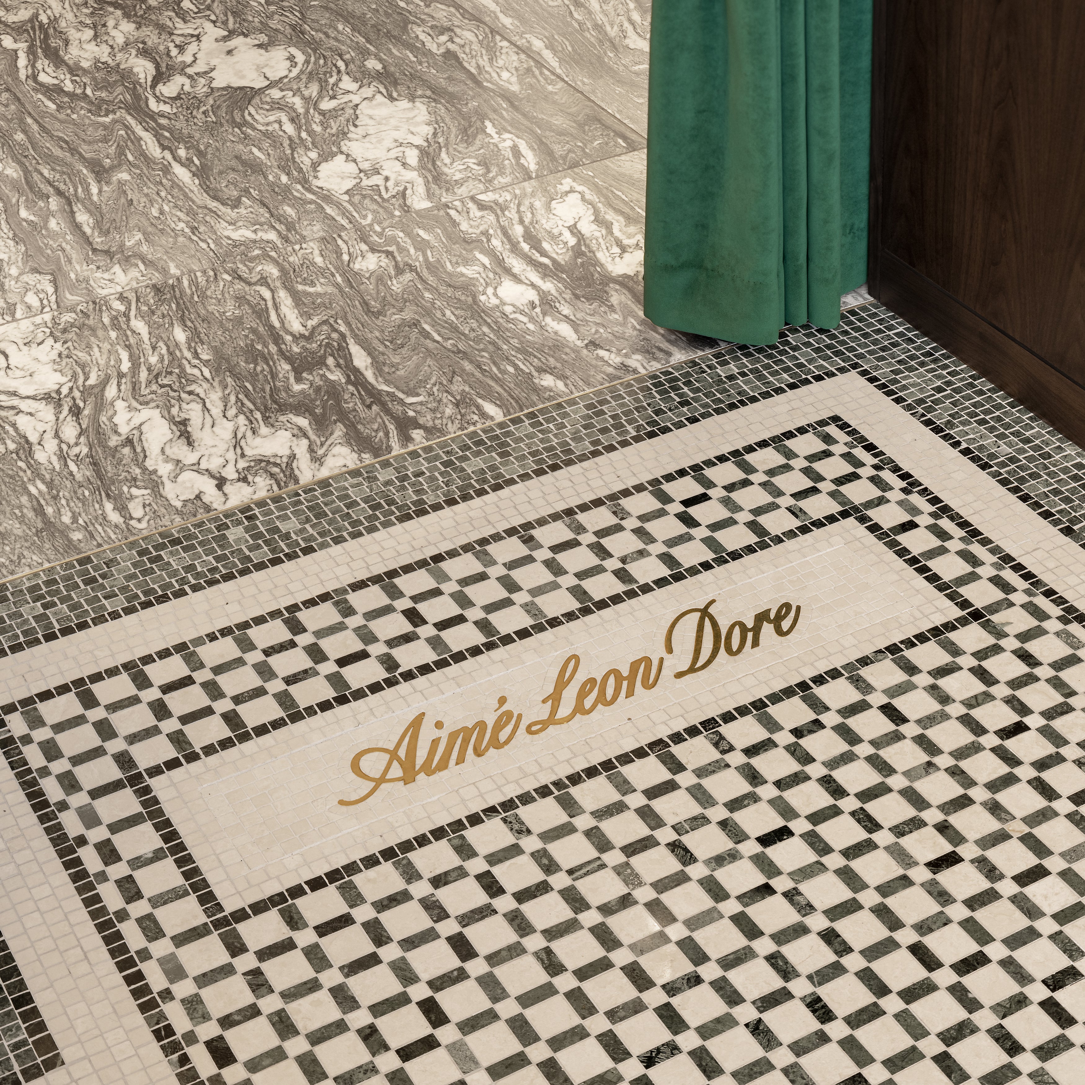 Logo in tile flooring at London flagship store