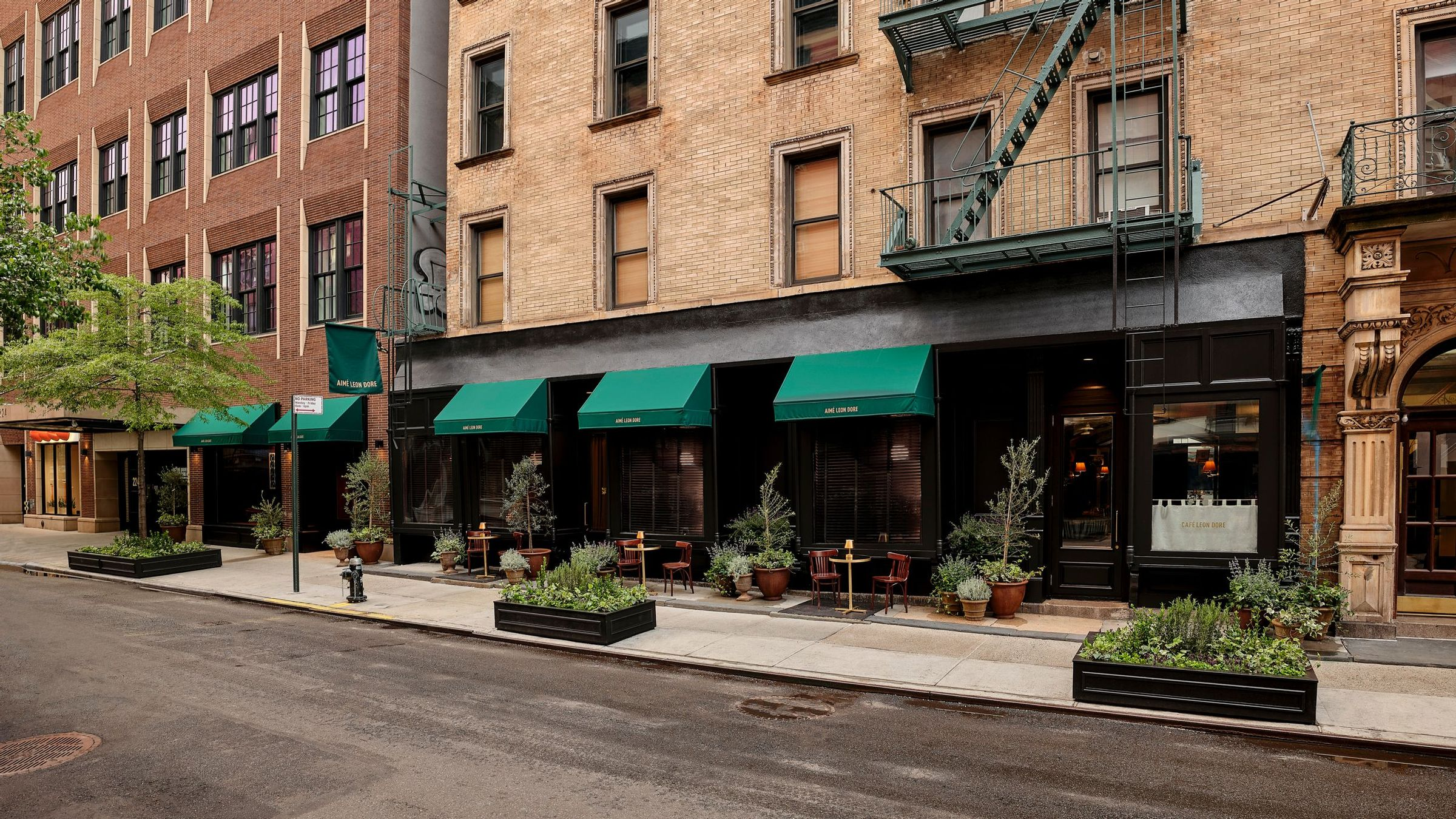 Sidewalk view of Café Leon Dore, 214 Private lounge and New York City flagship on Mulberry Street
