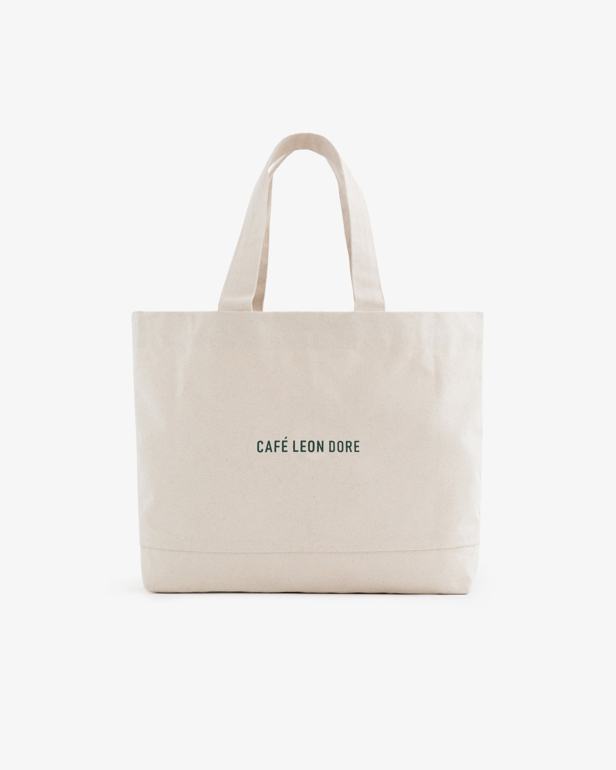 Beige Café Leon Dore Tote Bag with small black "CAFÉ LEON DORE" print on the front.