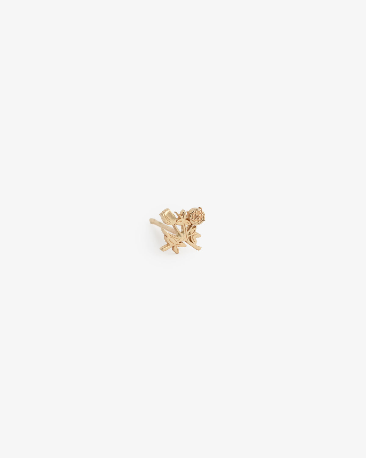 The 14Kt Gold Crest Earring is a small gold stud shaped like a rose with stem and leaves, shown on a white background.