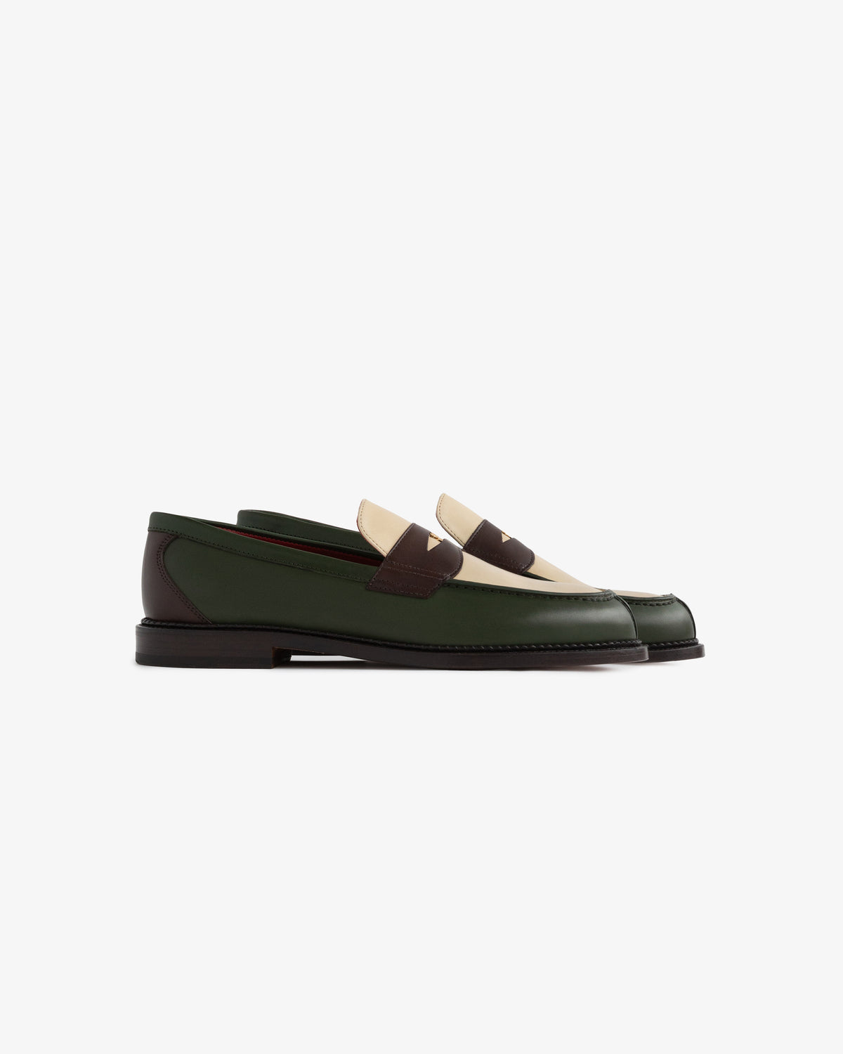 Queens Crest Loafer in green and brown leather with cream accents, shown side view on a white background.