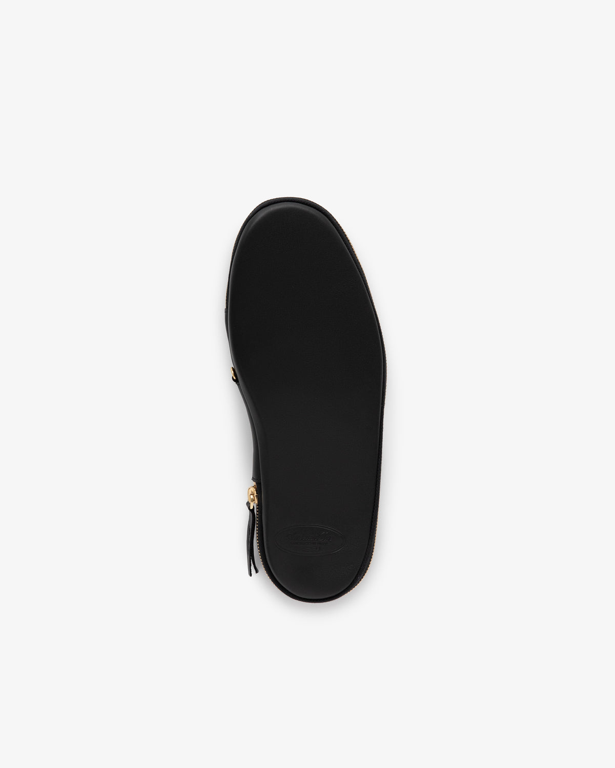 The sole of the Leather Travel Slipper, shown in black from beneath against a white background.