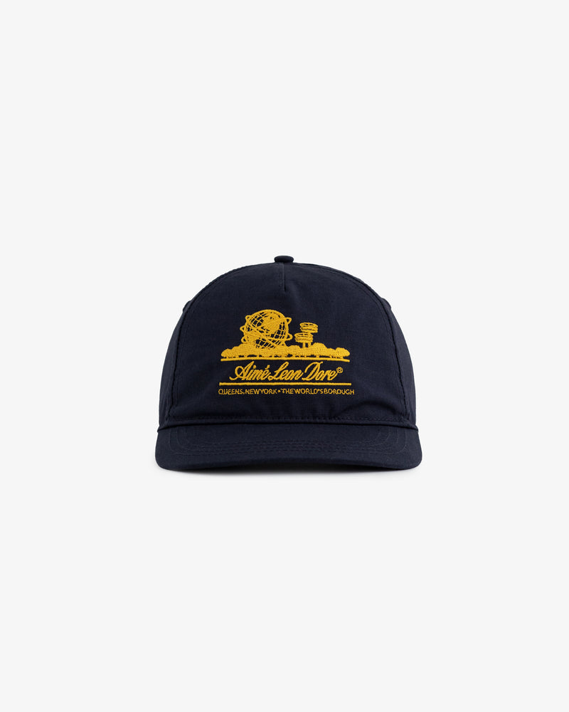 Unisphere Hat in navy with a yellow embroidered globe and Aimé Leon Dore text on the front.