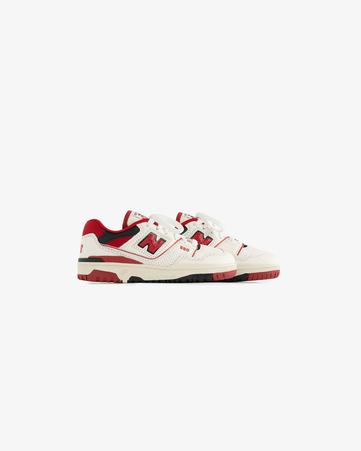 ALD / NB P550 Basketball Oxfords for kids in white and red, with black accents, textured design, and bold N logo.