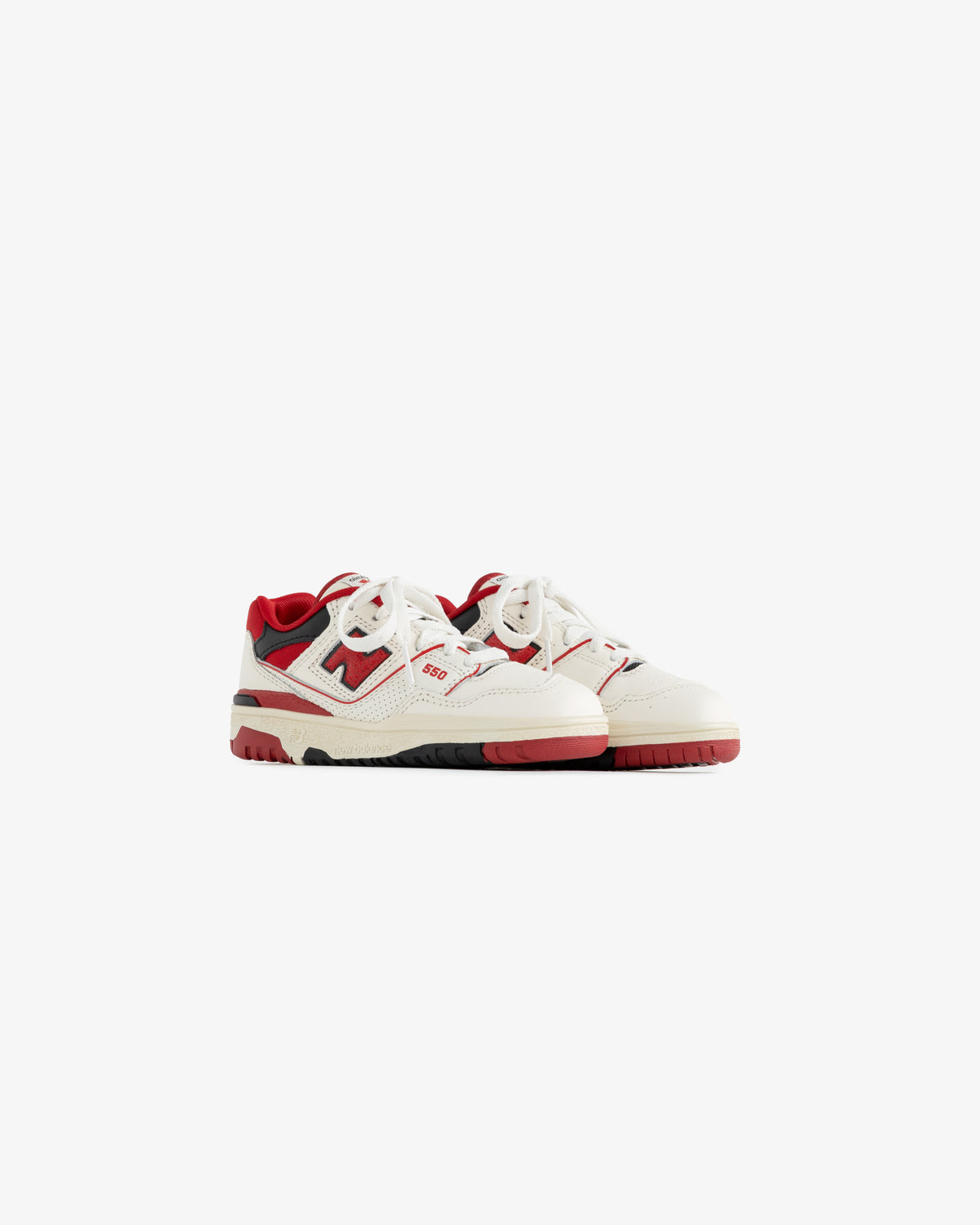 The ALD / NB P550 Basketball Oxfords for little kids in white, red, and black are shown on a plain white background.