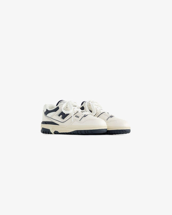 ALD / NB P550 Basketball Oxfords for little kids in white and navy with laces, shown on a plain white background.