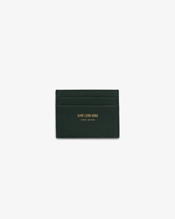 Leather Card Holder in dark green with gold AIMÉ LEON DORE text and two card slots, shown on a white background.