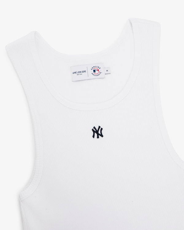 Yankees Tank Top: White ribbed tank with black New York Yankees logo on chest and visible collar tag.