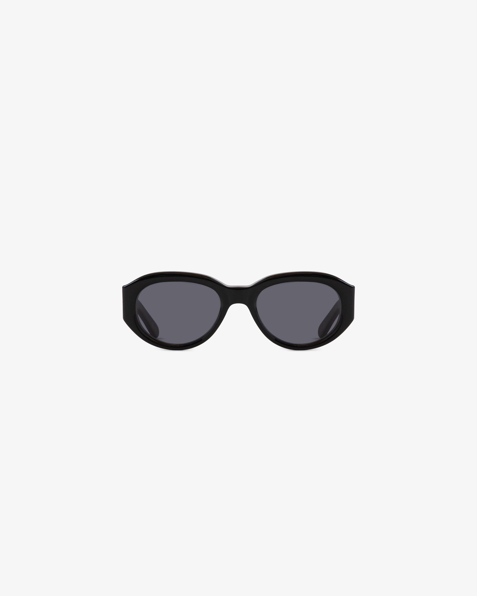 Jackie O Sunglasses—black oval frames with dark lenses on a plain white background.
