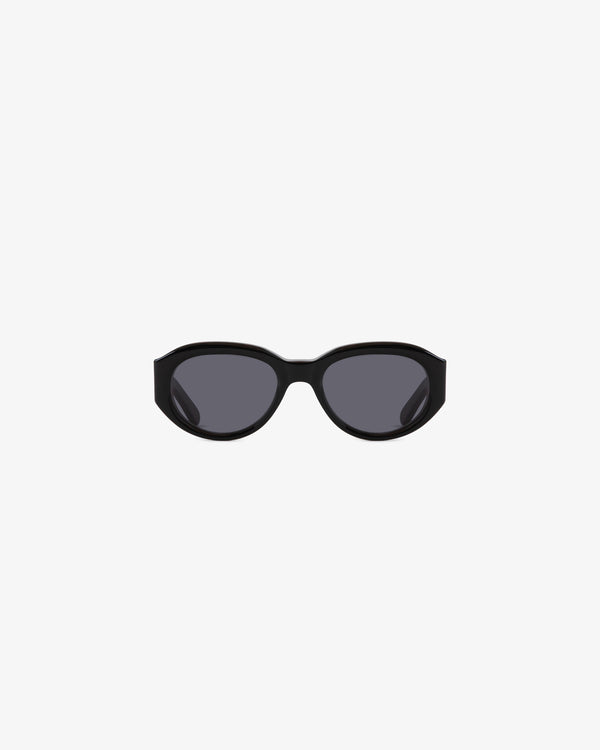 Jackie O Sunglasses—black oval frames with dark lenses on a plain white background.