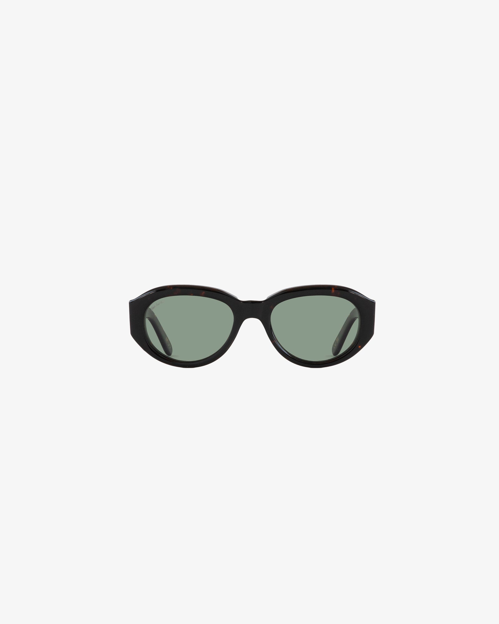 Jackie O Sunglasses: black oval frames with green tinted lenses, shown on a plain white background.