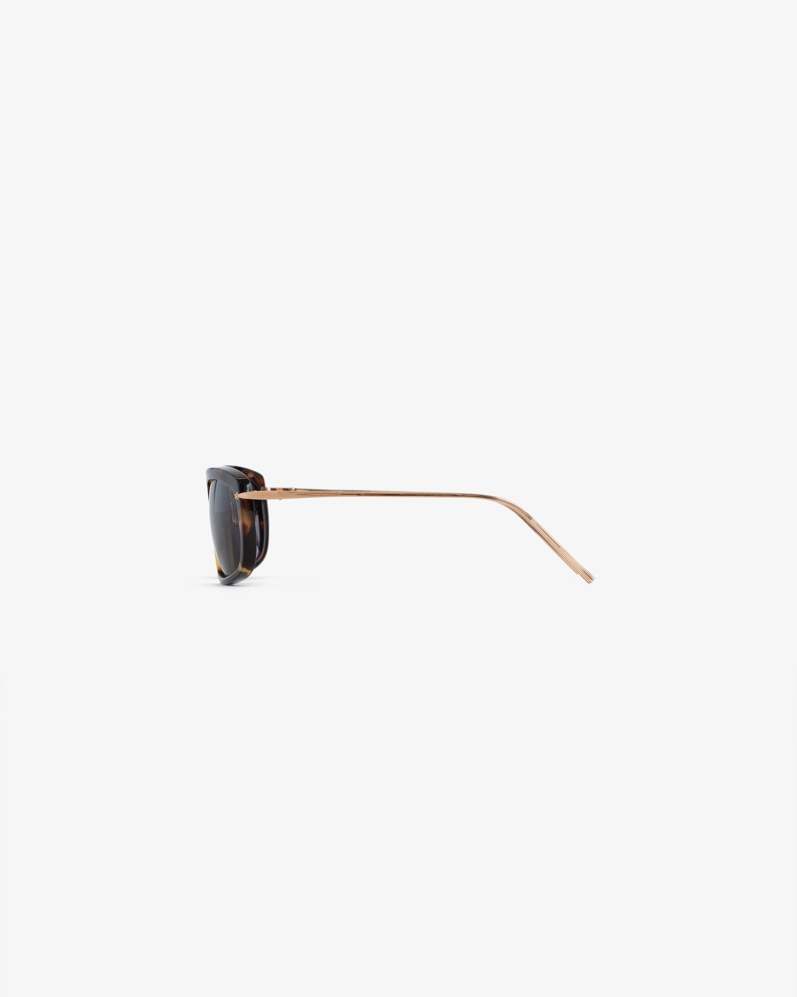 Side view of Ace Sunglasses with tortoiseshell frames and thin gold arms on a plain white background.