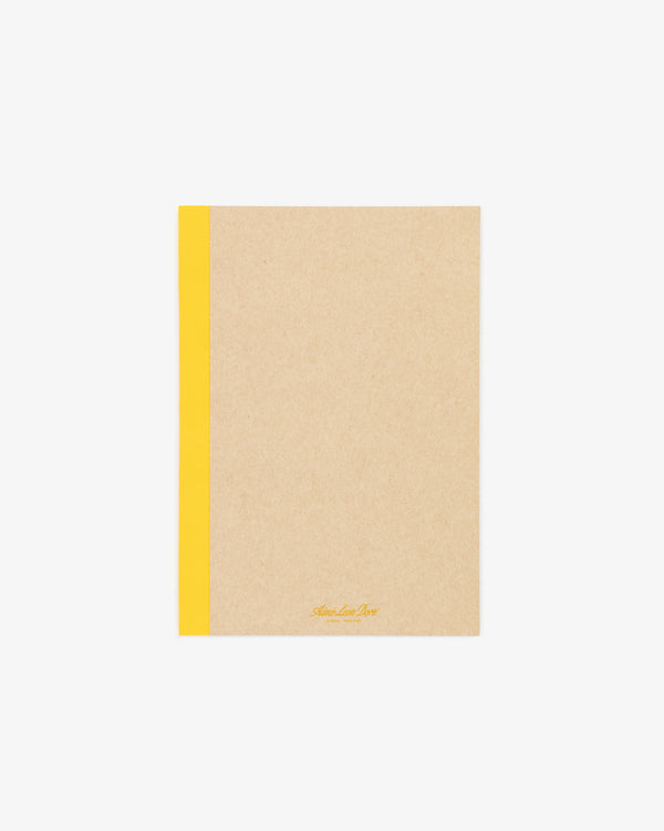 A Notebook 3-Pack with brown covers and yellow spines, viewed from above on a white background.