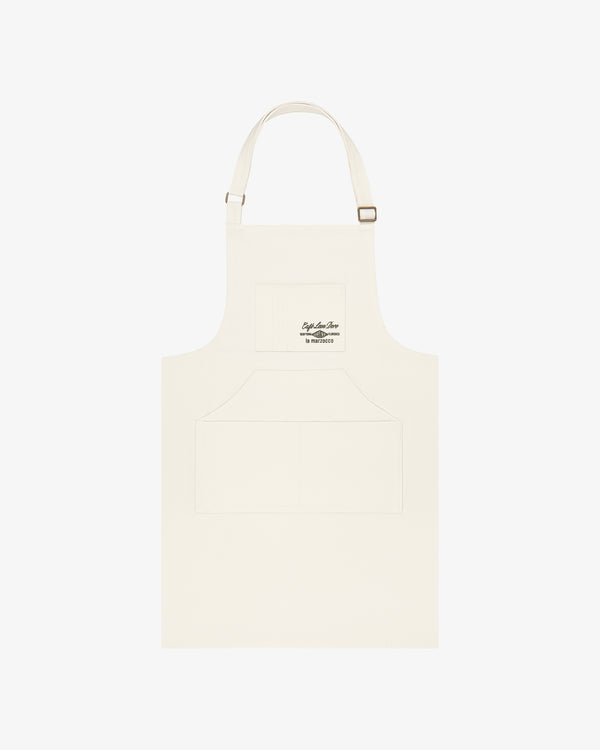 Café Leon Dore / La Marzocco Apron: Ivory with adjustable neck, front pockets, and small chest logo.