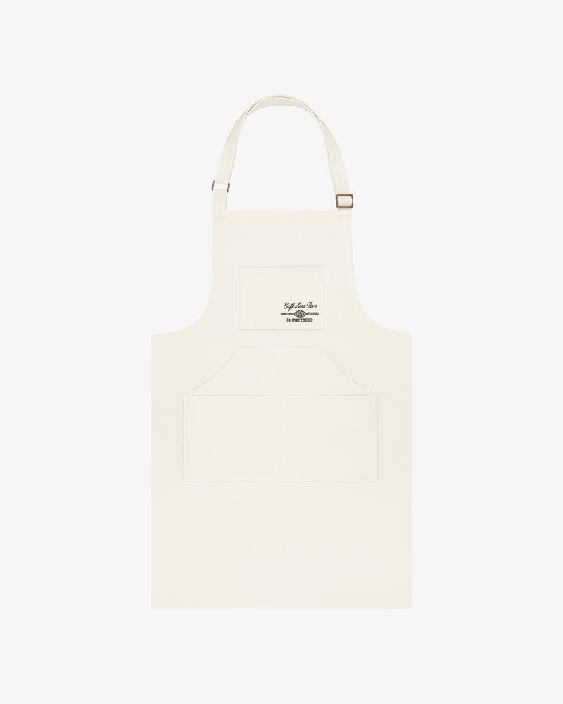 Café Leon Dore / La Marzocco Apron: Ivory with adjustable neck, front pockets, and small chest logo.