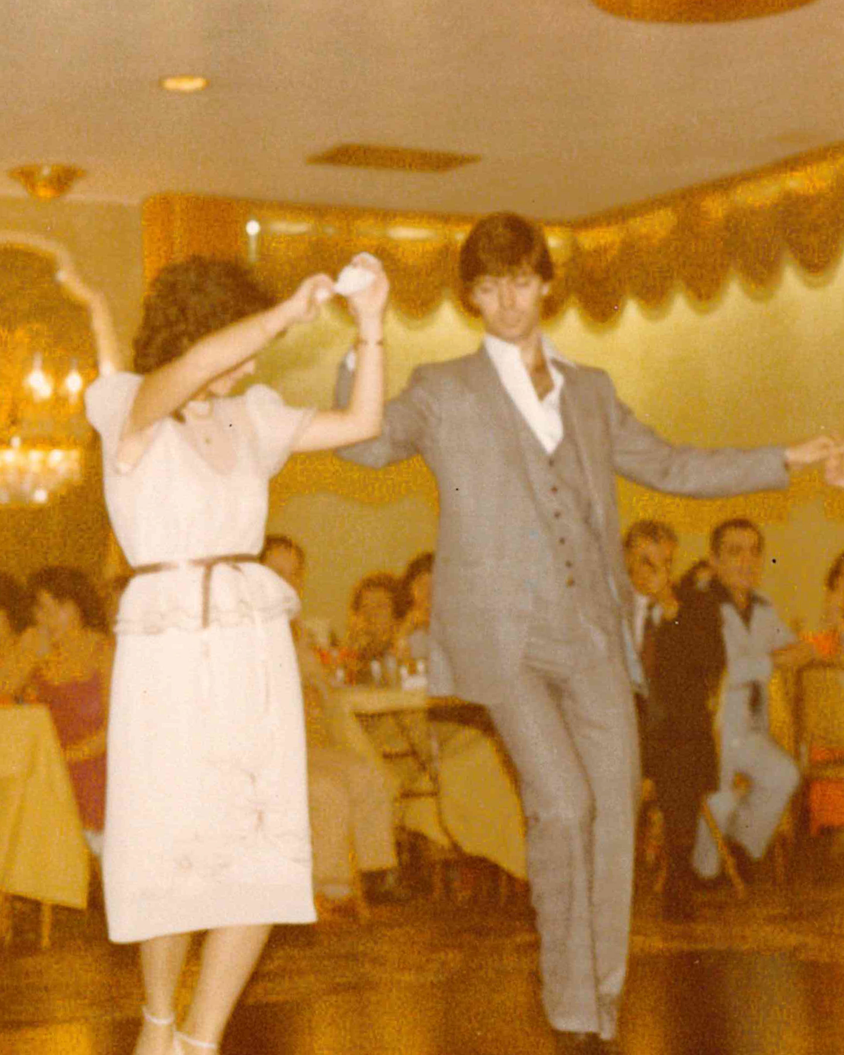 Couple dancing surrounded by onlookers