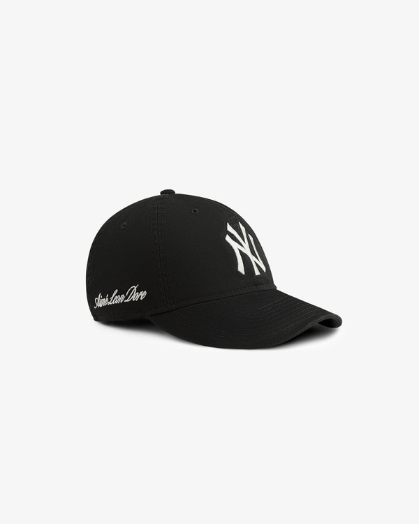 ALD/New Era Yankees Ballpark Hat in black with white NY logo and cursive text, shown on white background.