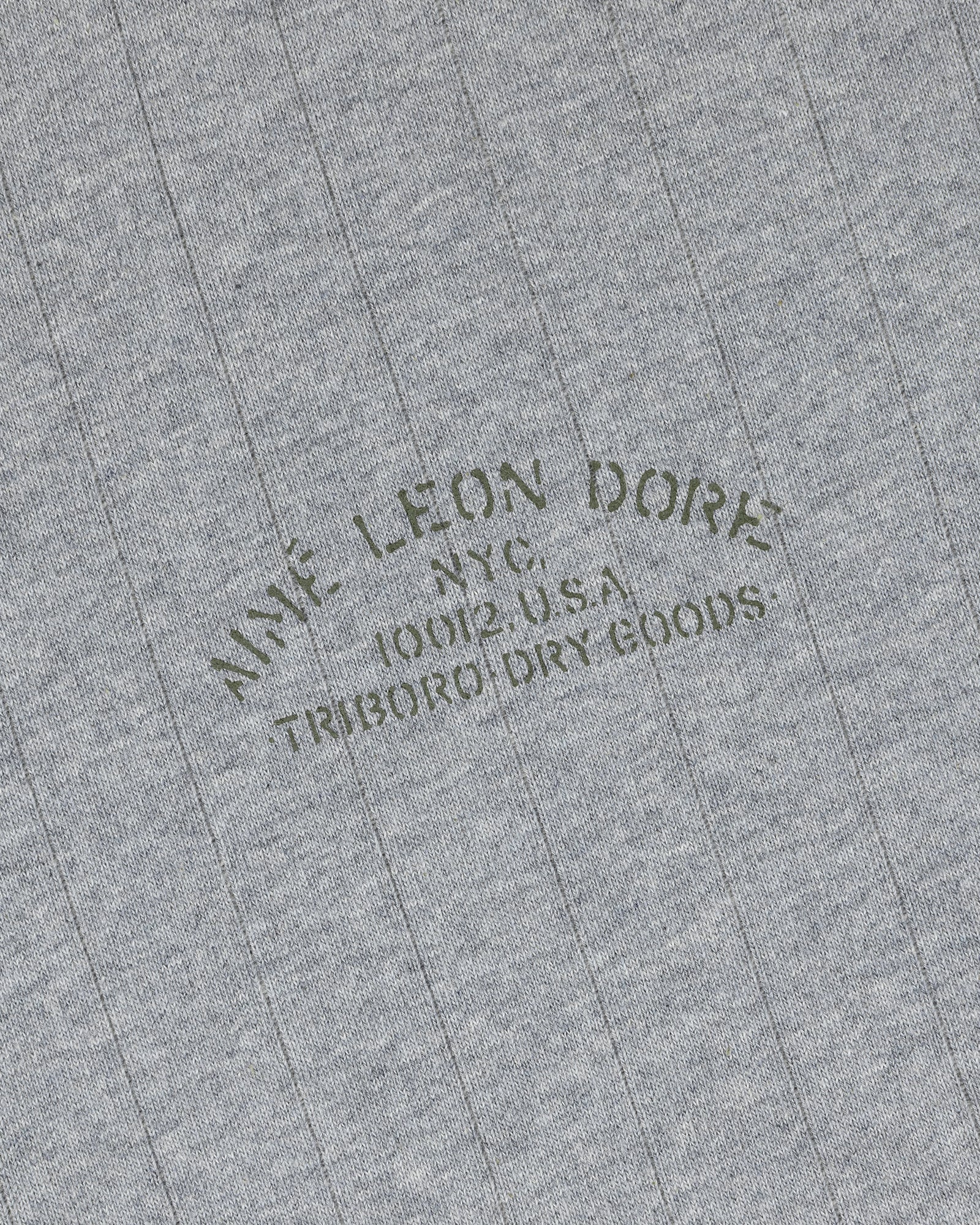 Gray Drop Needle Surplus Hoodie with thin stripes and AIMÉ LEON DORE NYC 10018 U.S.A TRIBORO DRY GOODS text.
