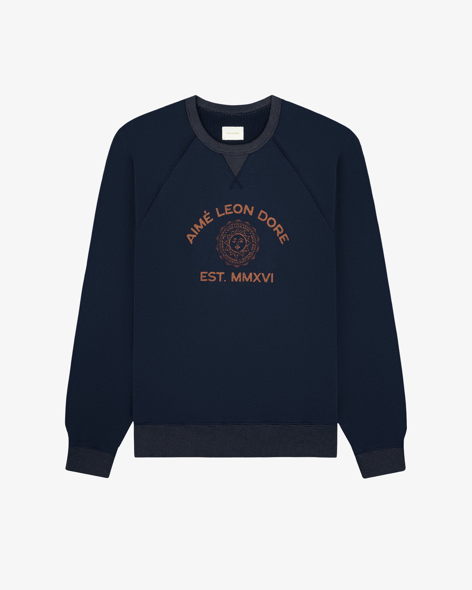 Souvenir Crewneck Sweatshirt in navy with gold AIMÉ LEON DORE EST. MMXVI and crest on front.