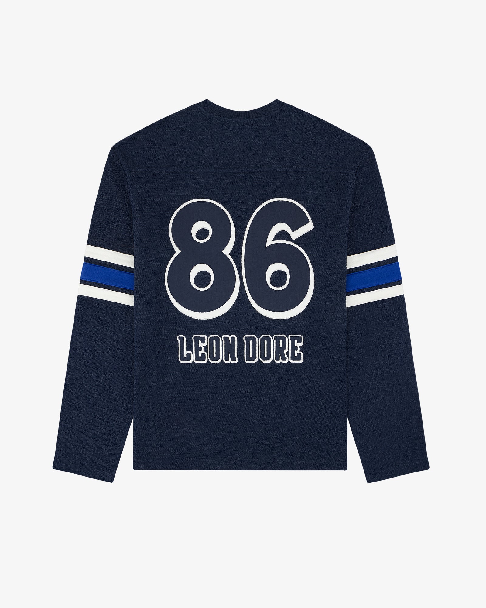 Legacy Slub Football Jersey: Navy long-sleeve with white 86 & LEON DORE on back, blue/white striped sleeves.