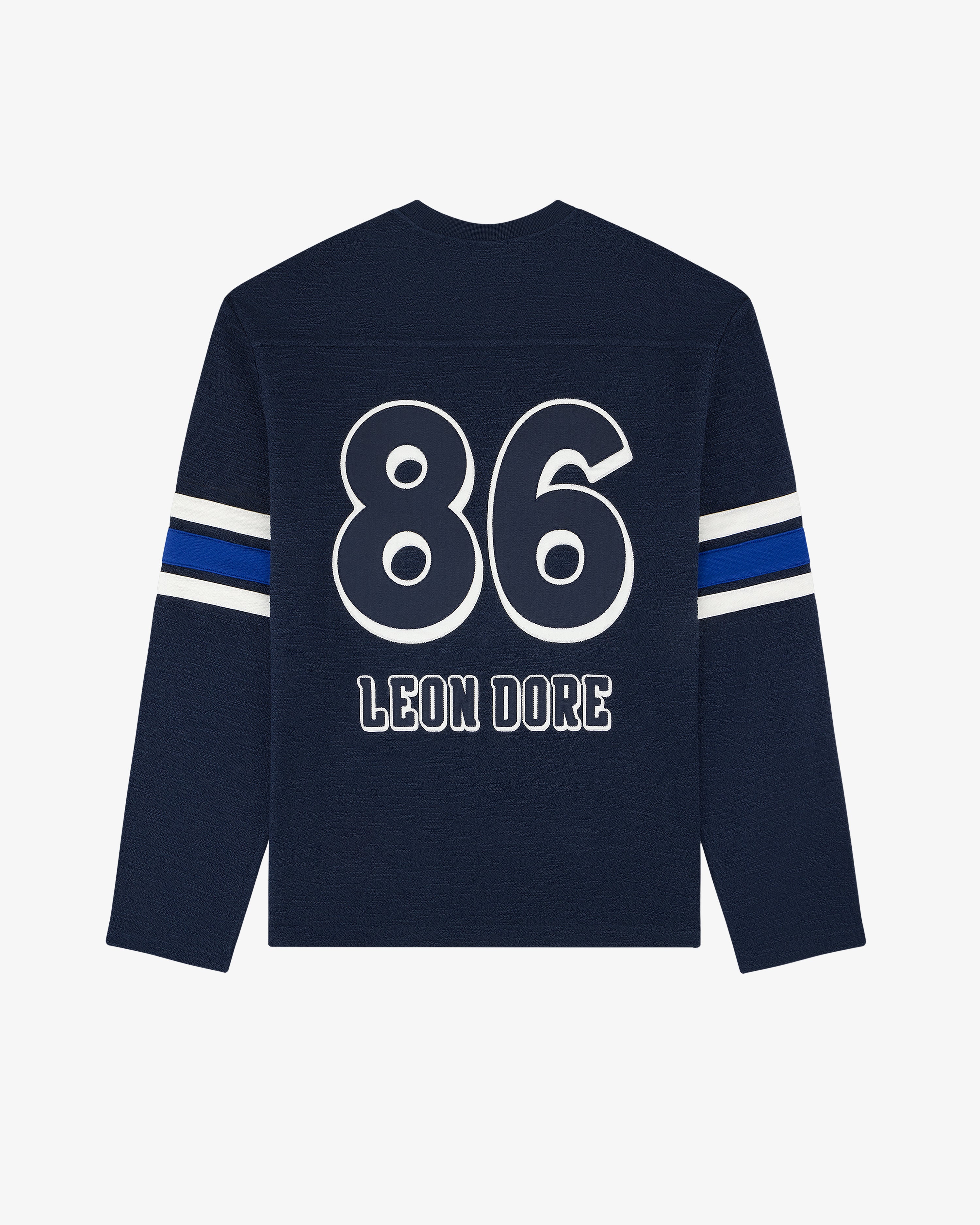 Legacy Slub Football Jersey: Navy long-sleeve with white 86 & LEON DORE on back, blue/white striped sleeves.