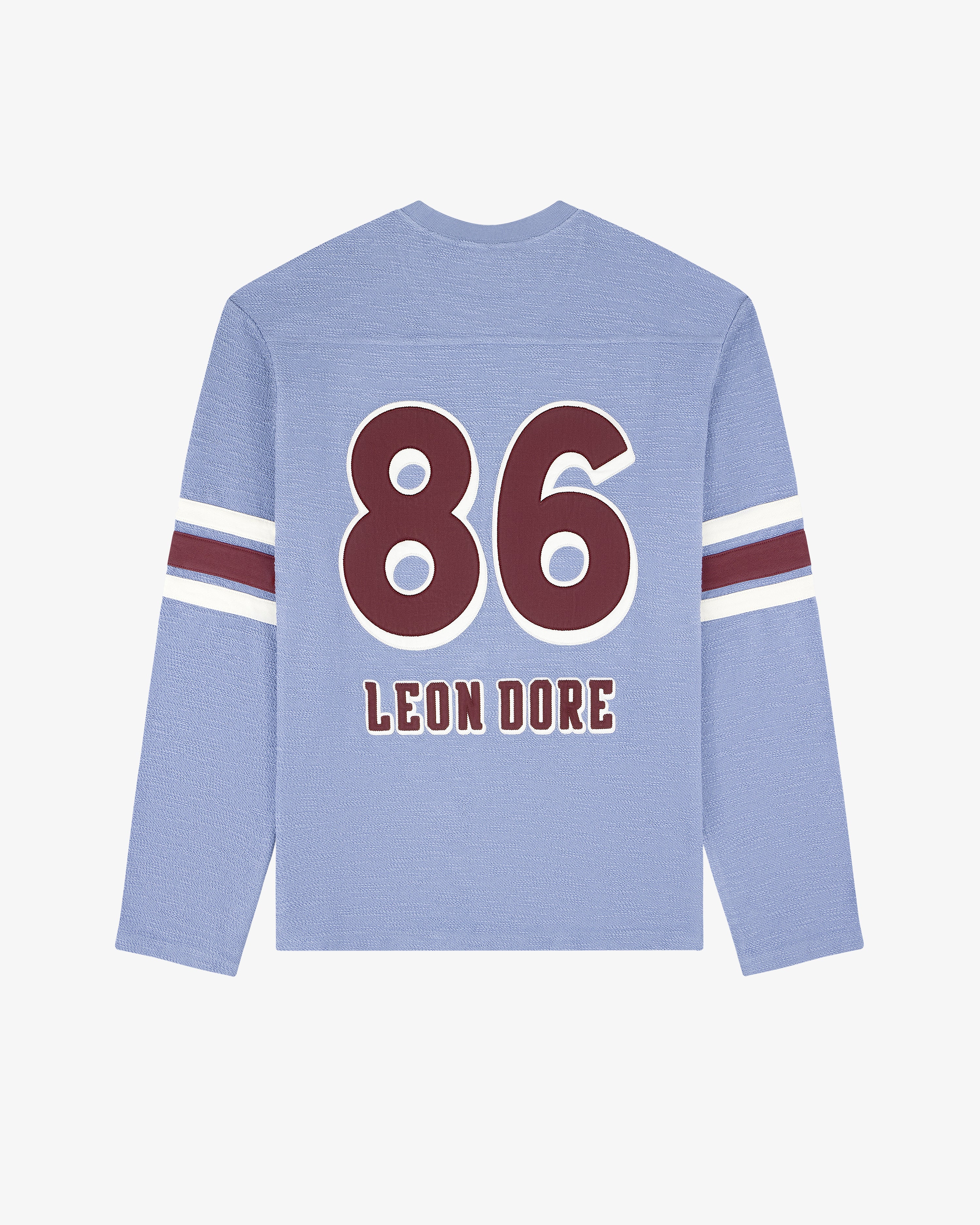 Legacy Slub Football Jersey: light blue, long sleeves, 86 & LEON DORE back, maroon/white striped sleeves.