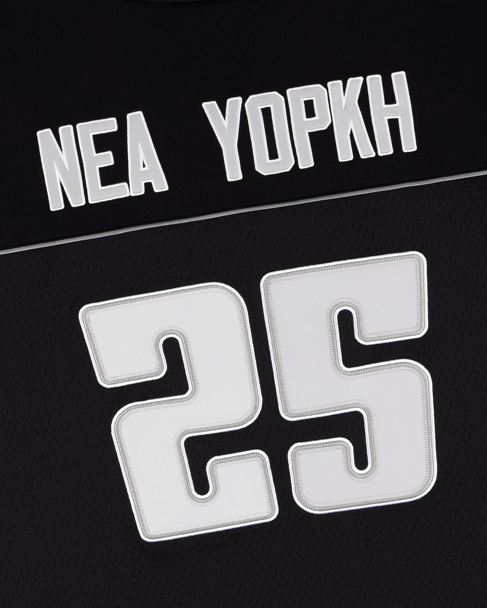 ALD / Mitchell & Ness Football Jersey: Black with “NEA YOPKH” and large white number 25 below.