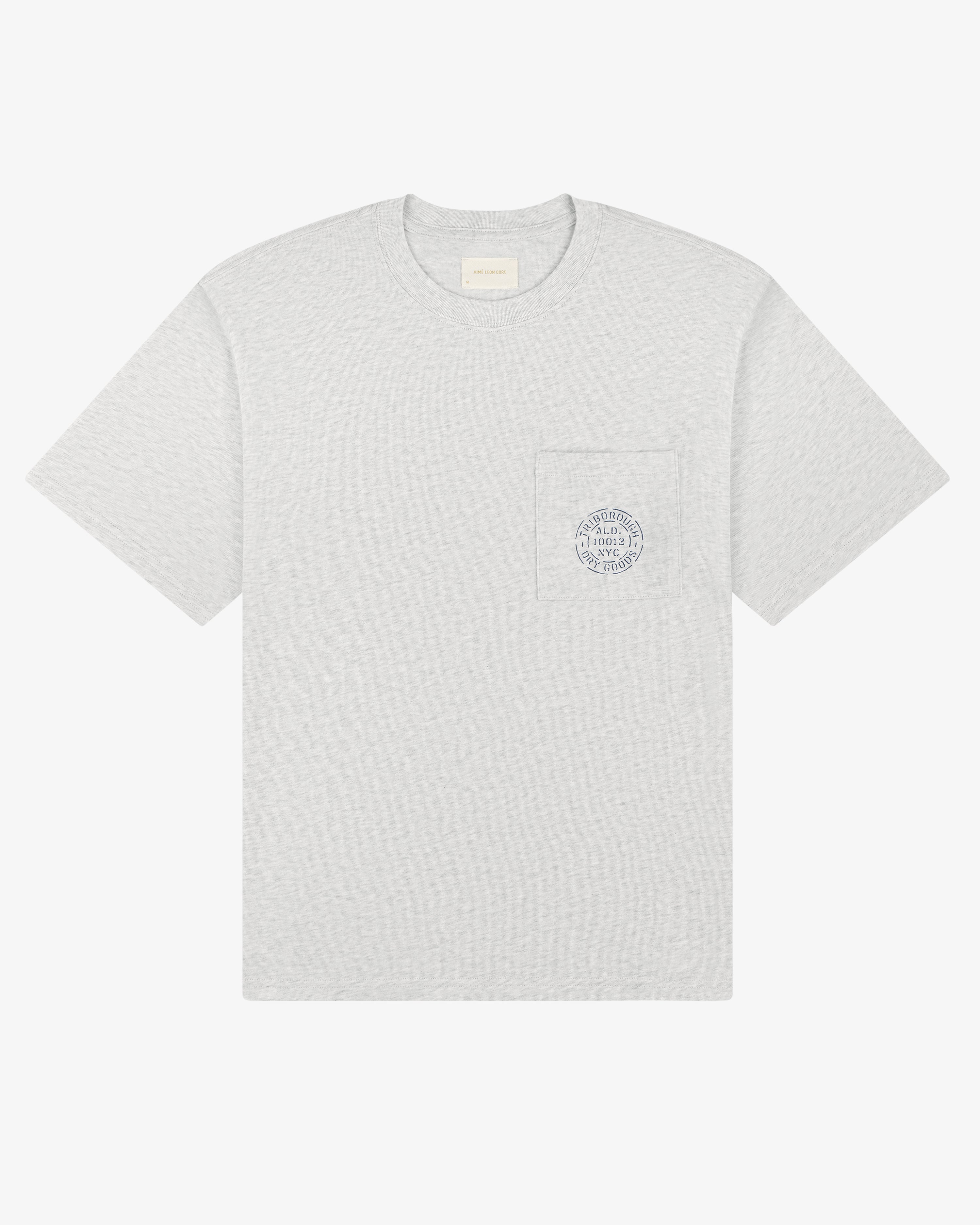 Triborough Dry Goods Pocket Tee in light gray with short sleeves and a small circular logo on the left chest pocket.