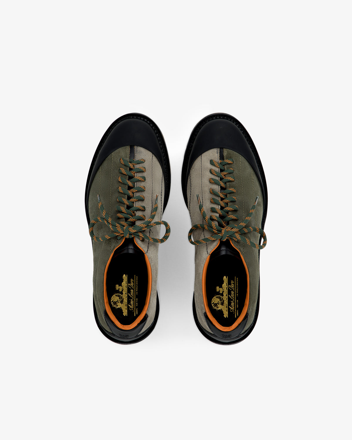 A pair of Suede Derby Hiker shoes in khaki and black with orange accents, shown from above on a white background.