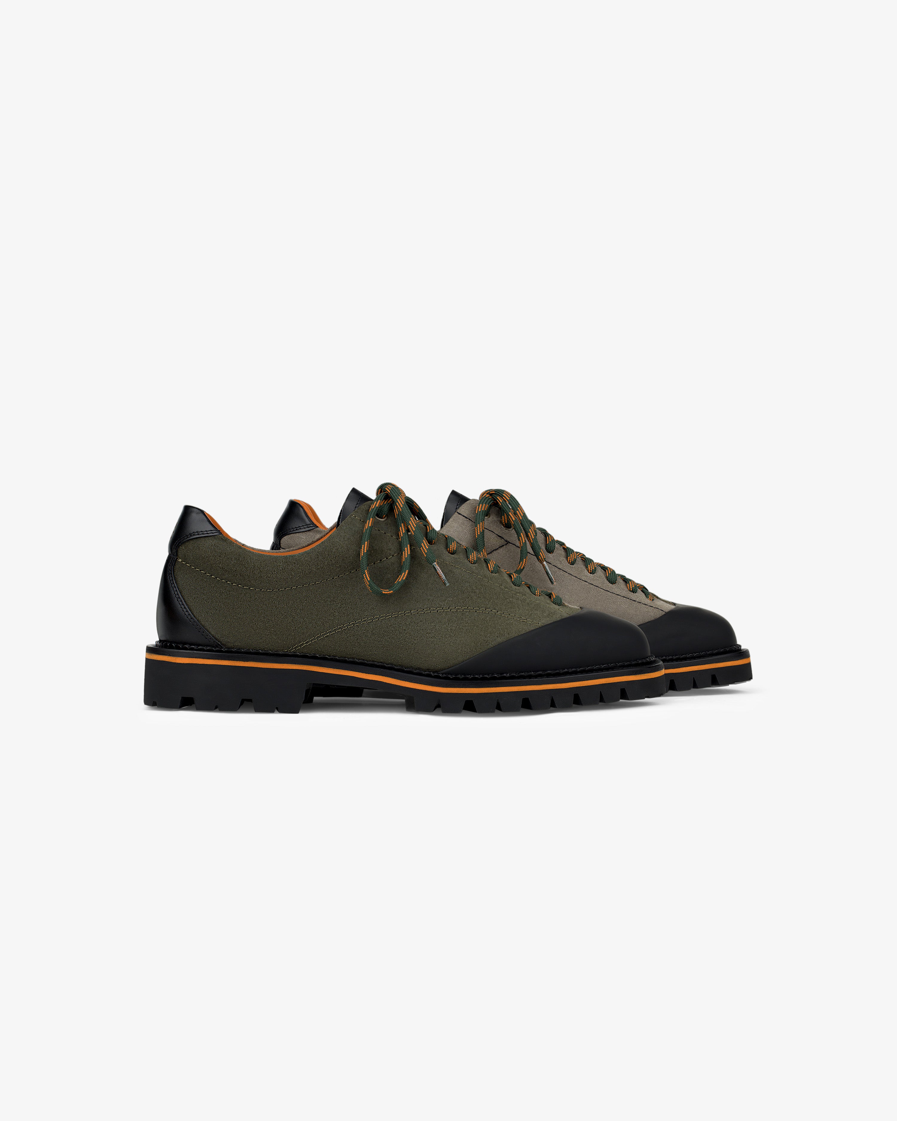 The Suede Derby Hiker: olive green and black low-top sneakers with rugged soles and patterned laces.