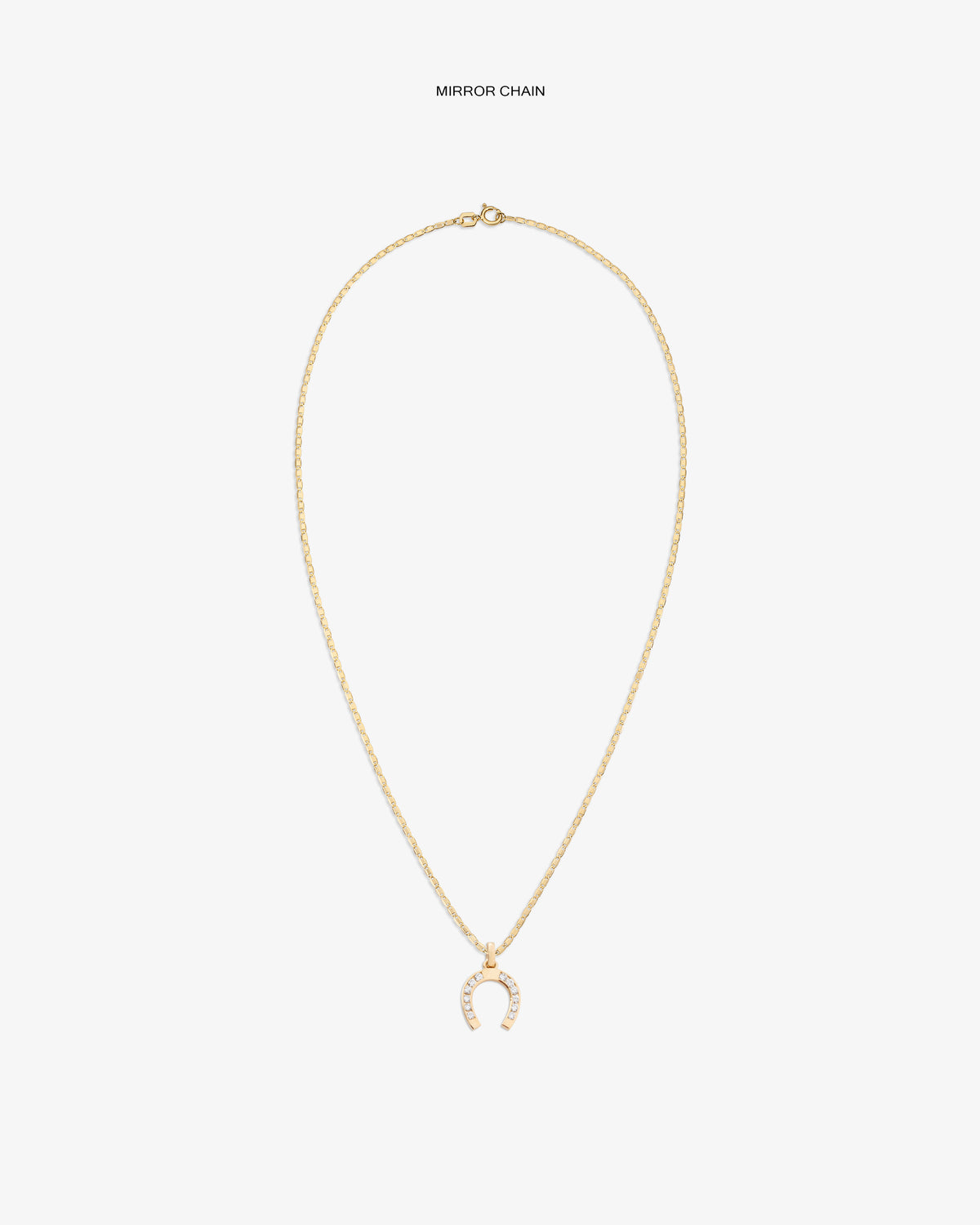 Diamond Horseshoe Pendant: gold chain with a horseshoe-shaped charm set with clear stones, shown on white background.