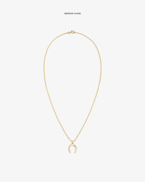 Diamond Horseshoe Pendant: gold chain with a horseshoe-shaped charm set with clear stones, shown on white background.