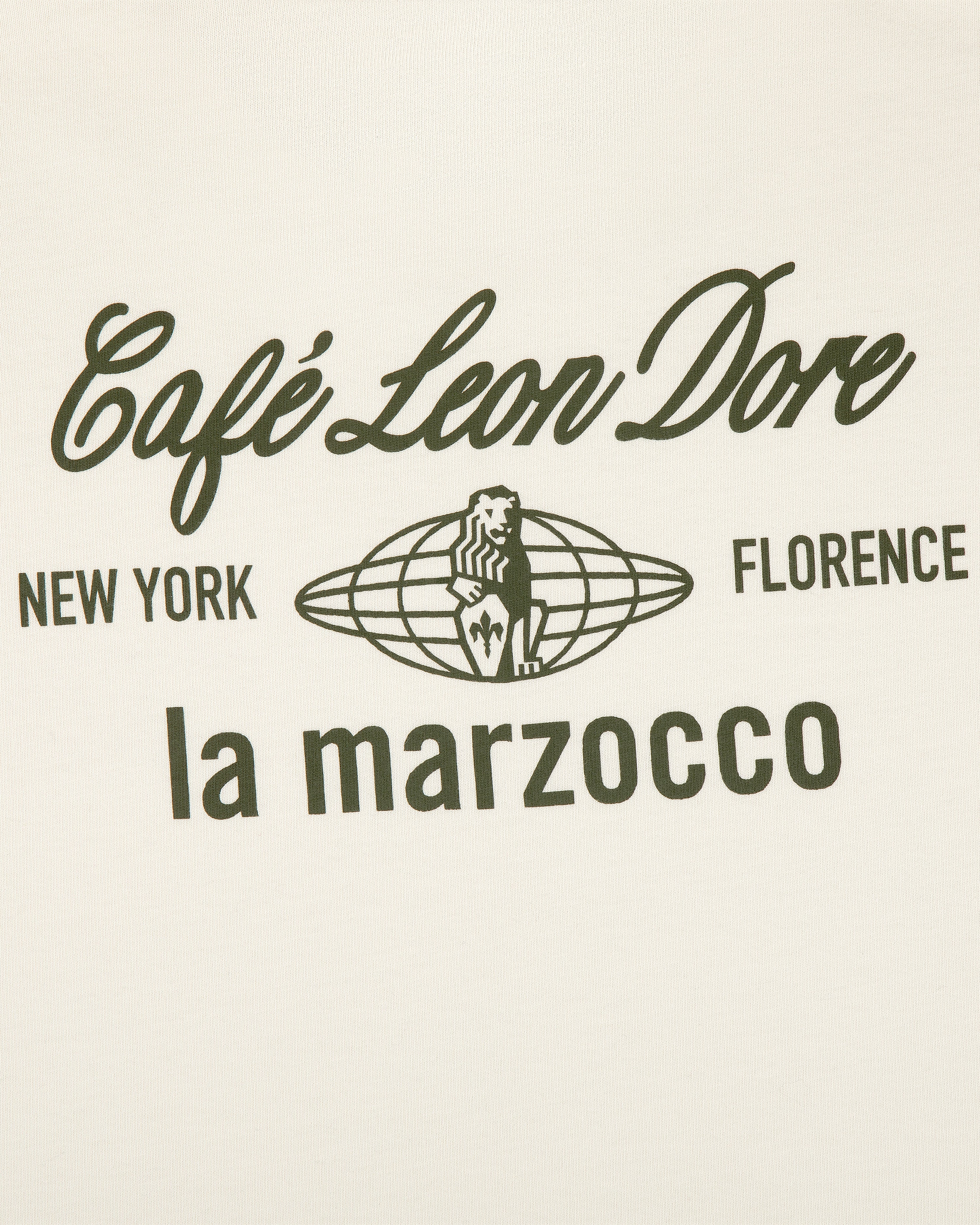 White tee with black Café Leon Dore, New York, Florence, la marzocco text and lion logo at the center.