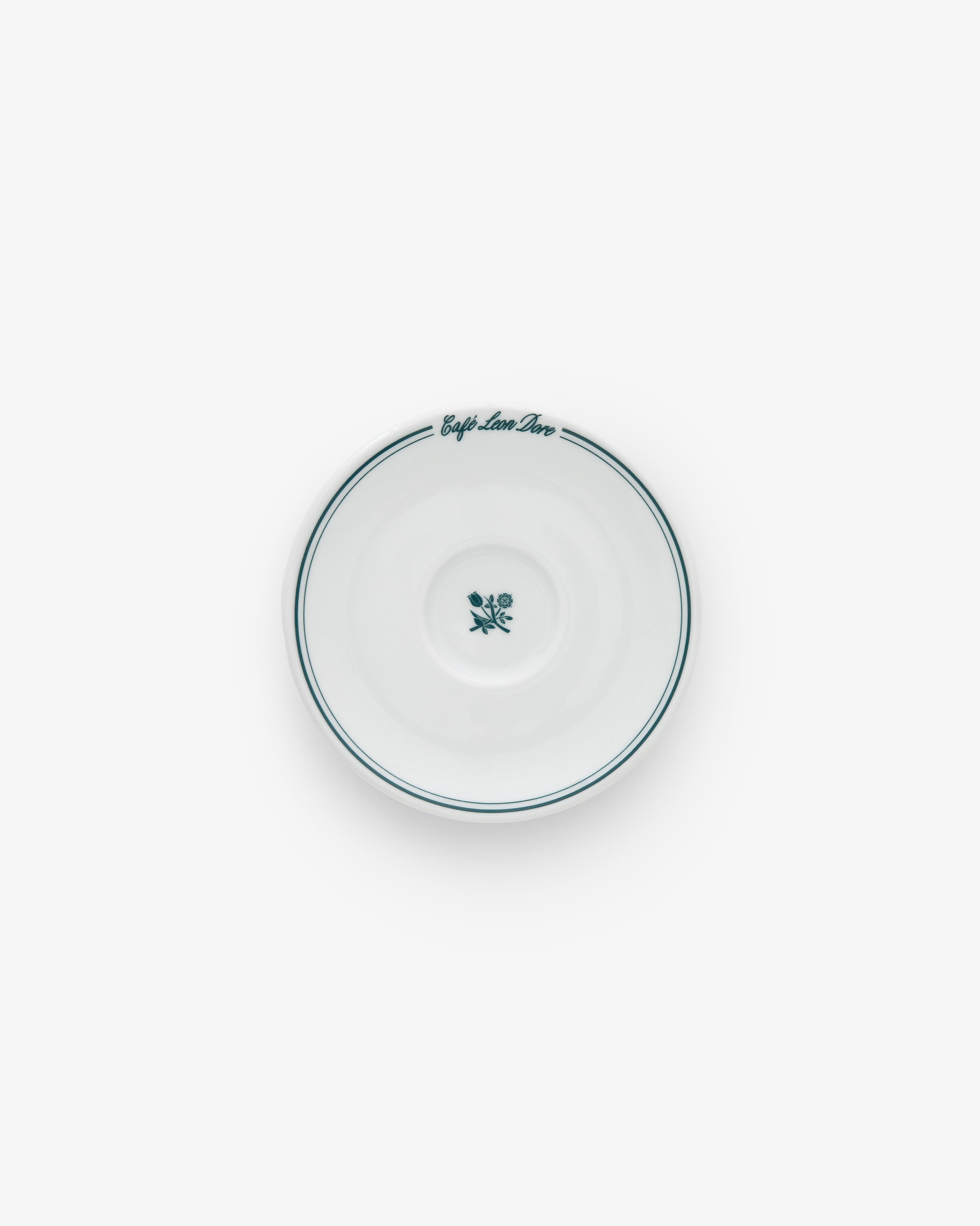 Café Leon Dore Espresso Cup & Saucer set: white with green border, floral design, and rim text on white background (set of 6).