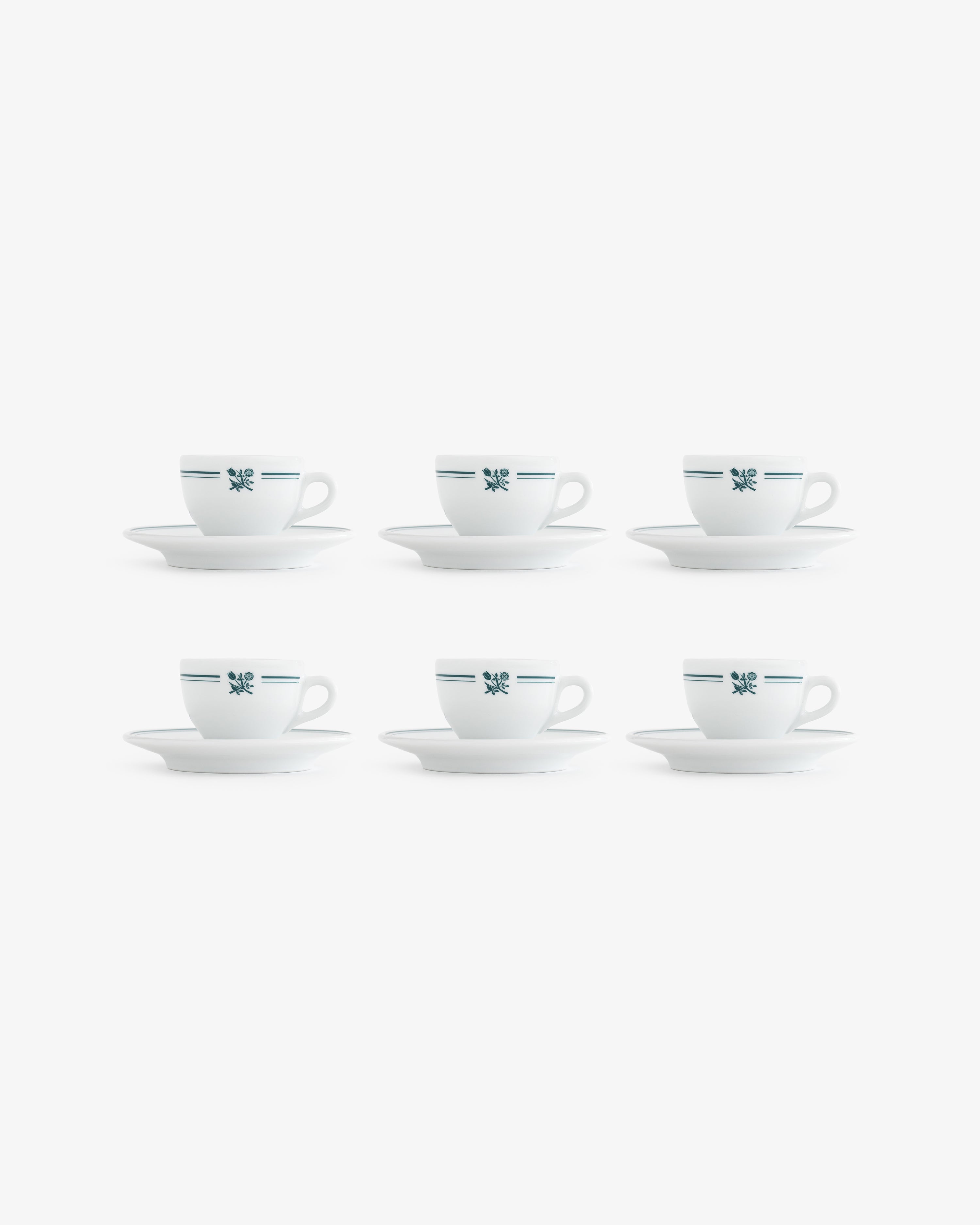 Set of 6 Café Leon Dore espresso cups & saucers, white with blue stripes and floral design, arranged in two rows.