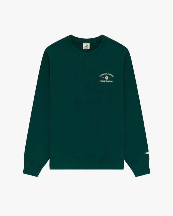 ALD / New Balance SONNY NY IFTB crewneck: dark green with small white graphic/text on left chest, shown on white.
