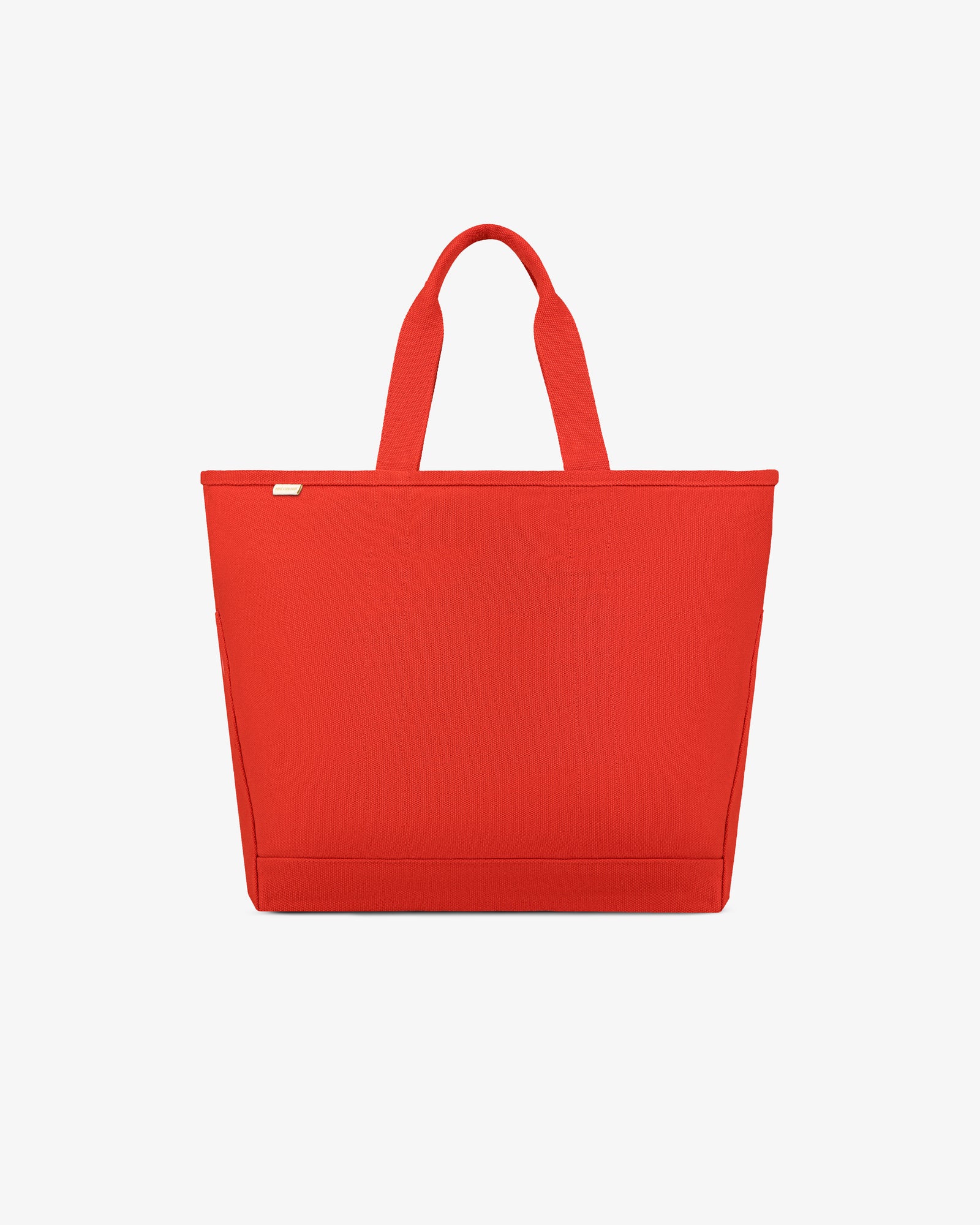 Large Unisphere Tote Bag in bright red with two handles, shown against a plain white background.