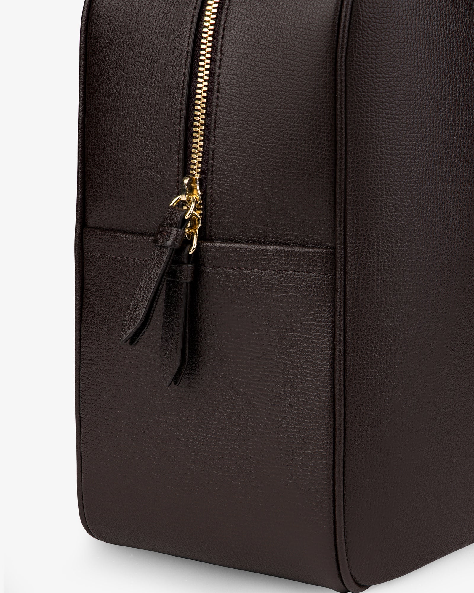 Close-up of the Full Grain Leather Briefcase Duffle with a gold zipper and two leather pulls on a plain light background.