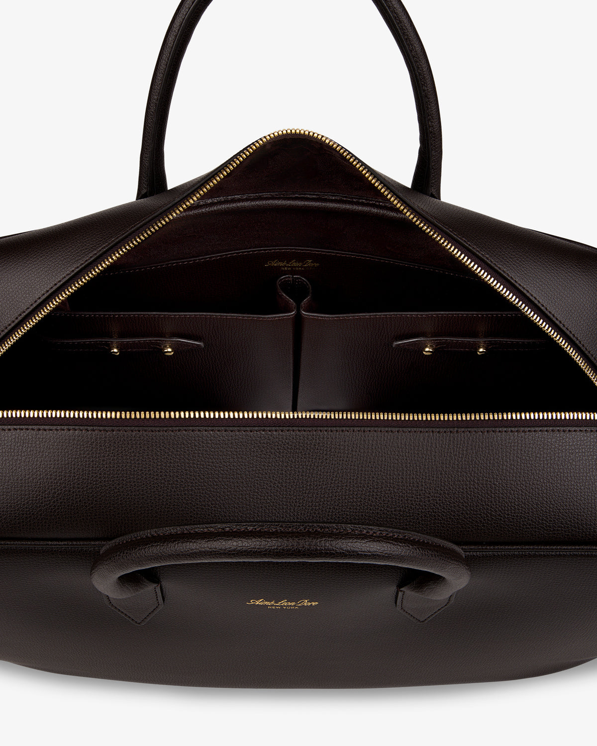 A Full Grain Leather Briefcase Duffle with gold zipper, organized interior pockets, and dual handles.