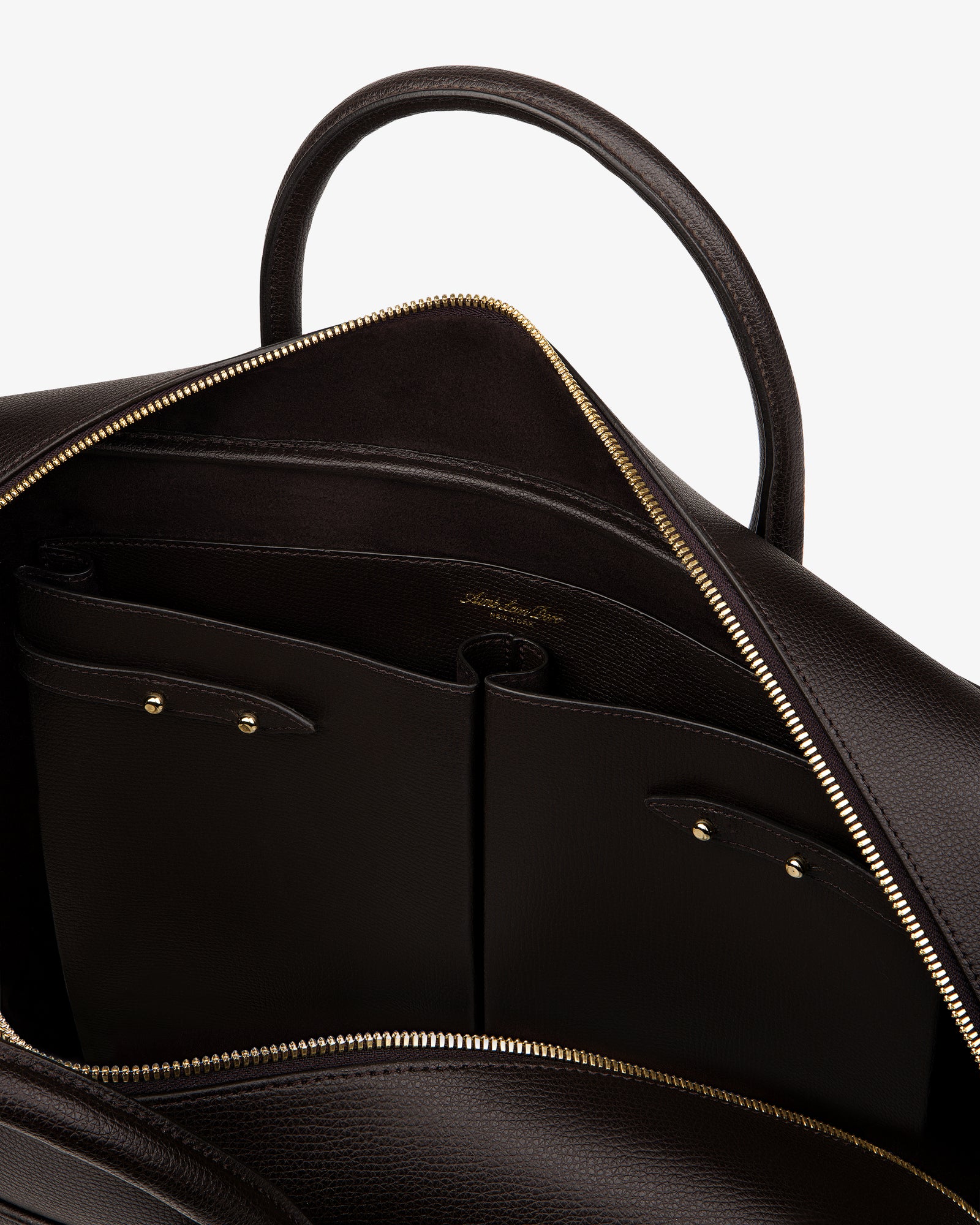 Open Full Grain Leather Briefcase Duffle with gold zipper, showing interior pockets and embossed logo.