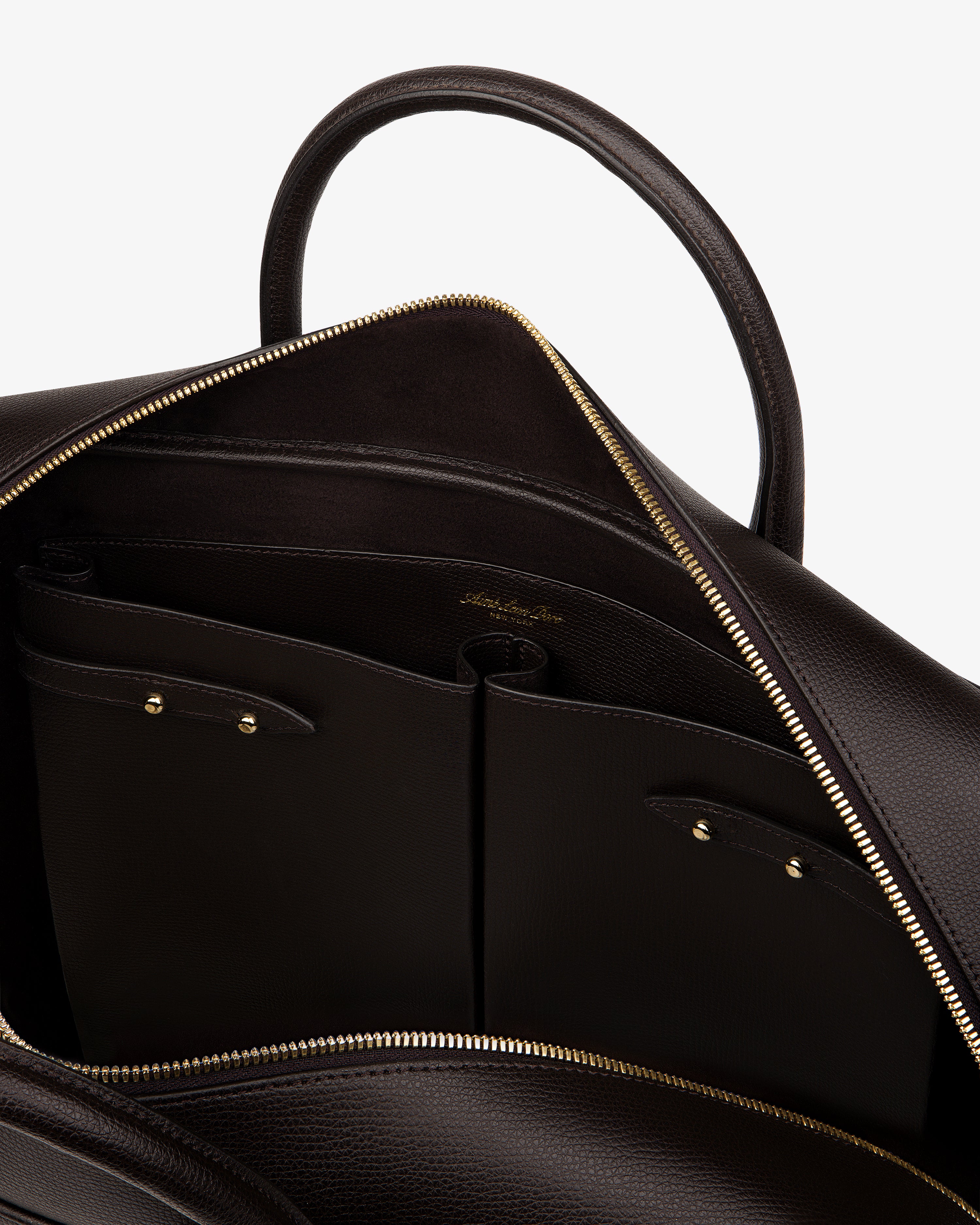 Open Full Grain Leather Briefcase Duffle with gold zipper, showing interior pockets and embossed logo.