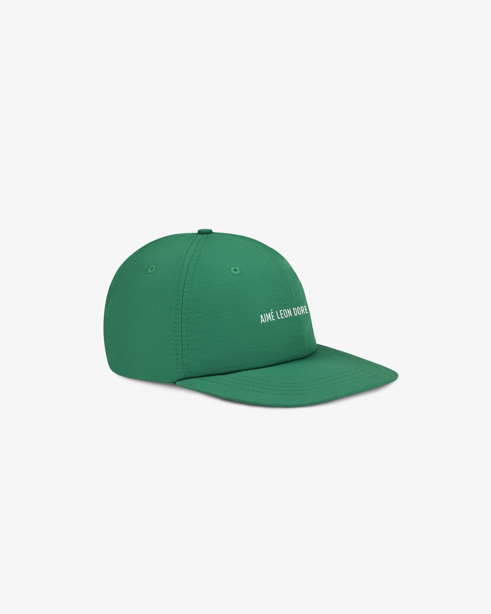 Green Nylon Sport Hat featuring white Aimé Leon Dore text, displayed on a plain white background.