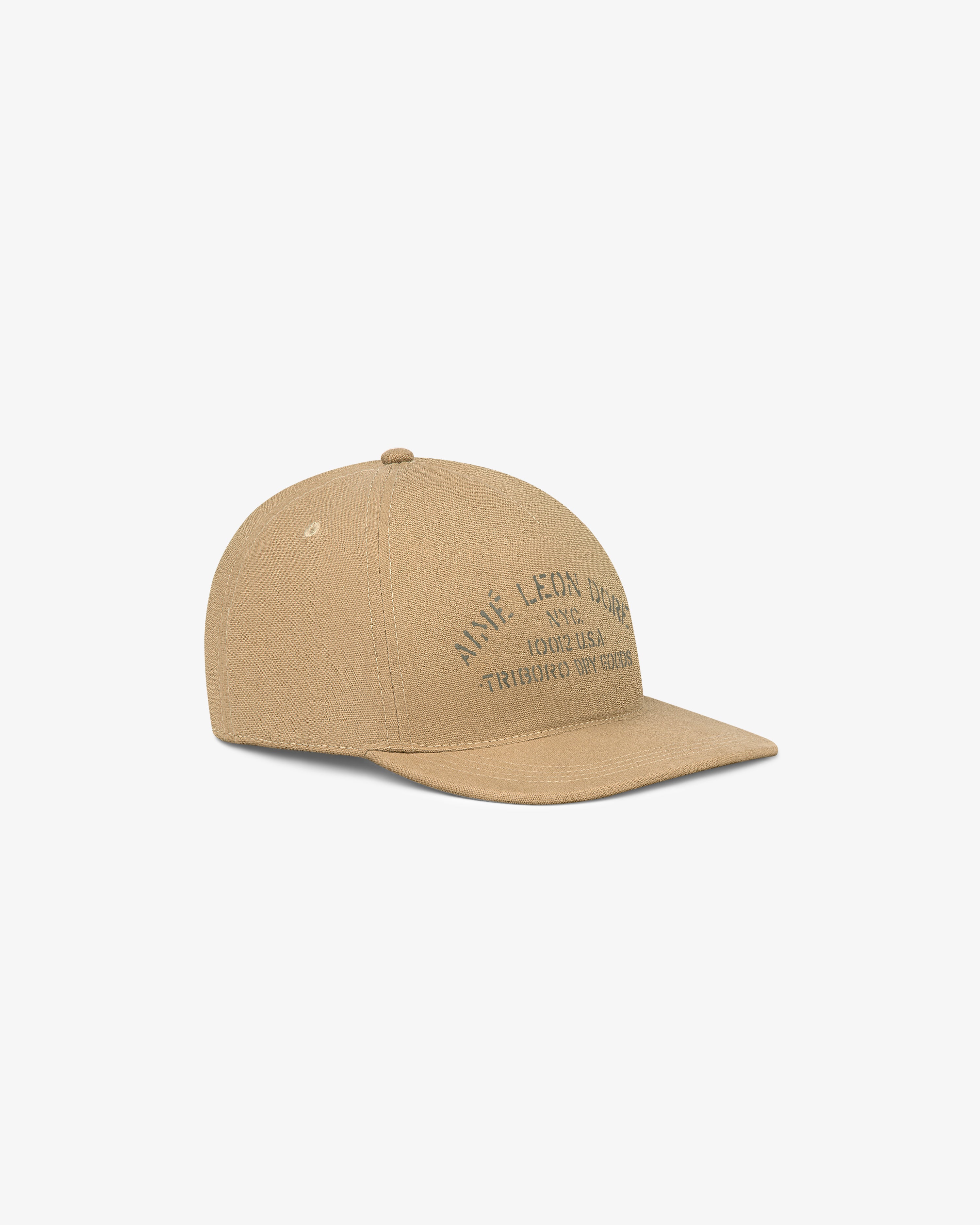 Triborough Dry Goods Hat in tan with black text on front, displayed against a plain white backdrop.