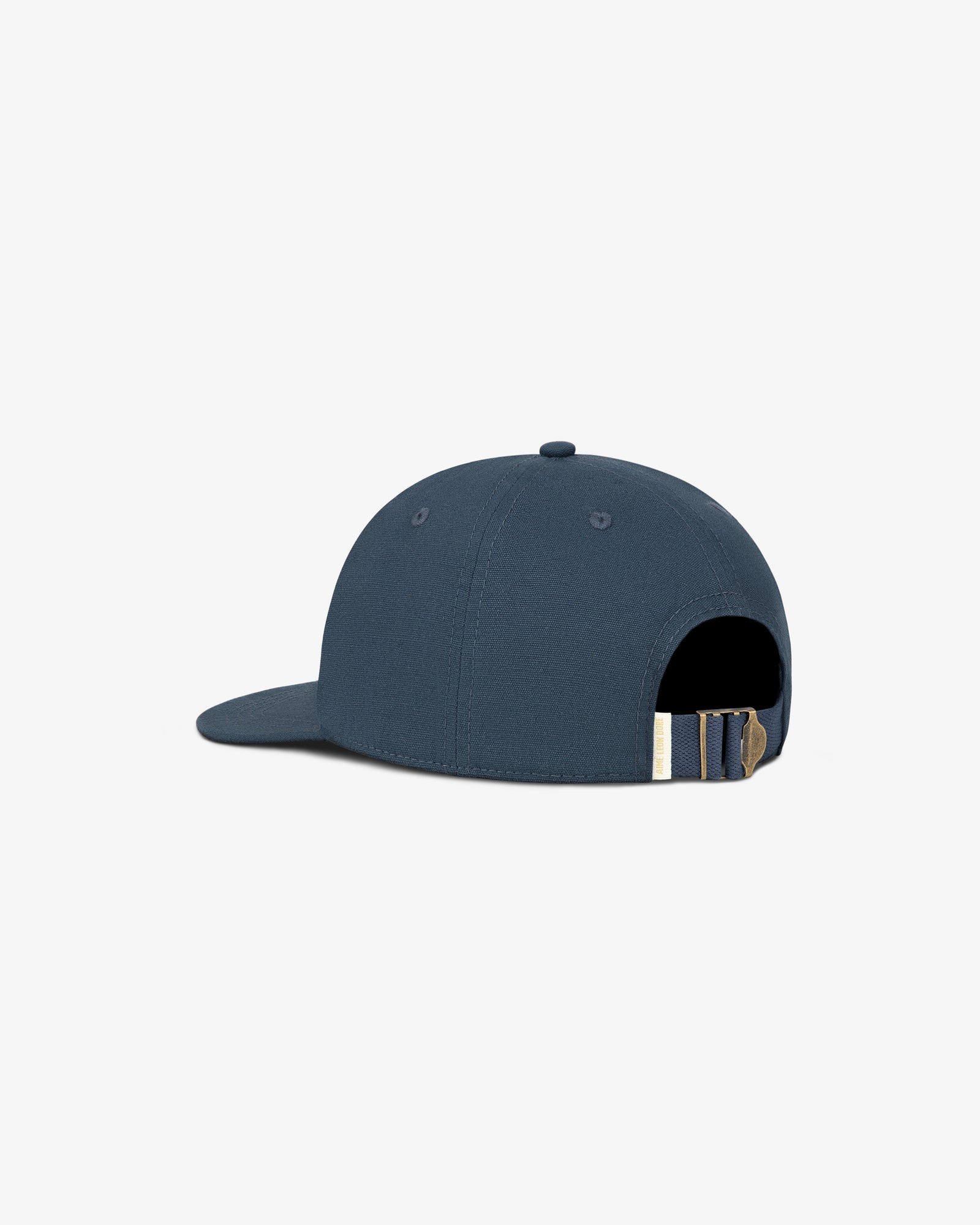 Back of Triborough Dry Goods Hat in navy blue, featuring adjustable strap and metal buckle on white background.