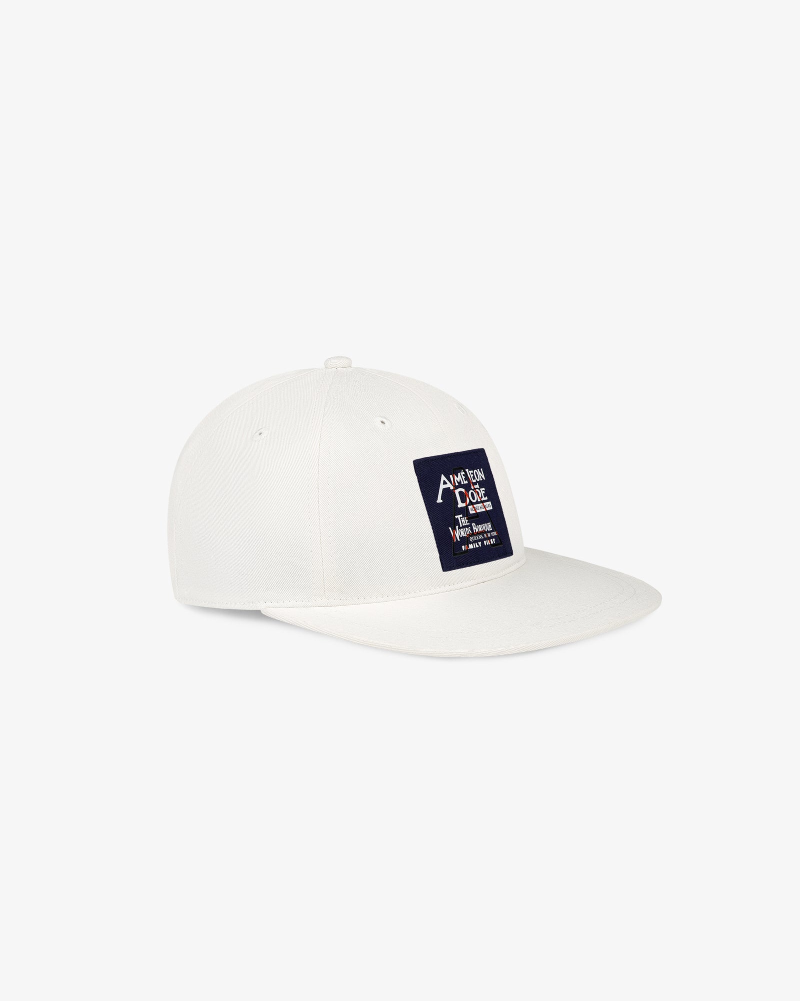 Record Breakers Wide Bill Hat: White cap with navy patch, white text, and small yellow accents on the front.