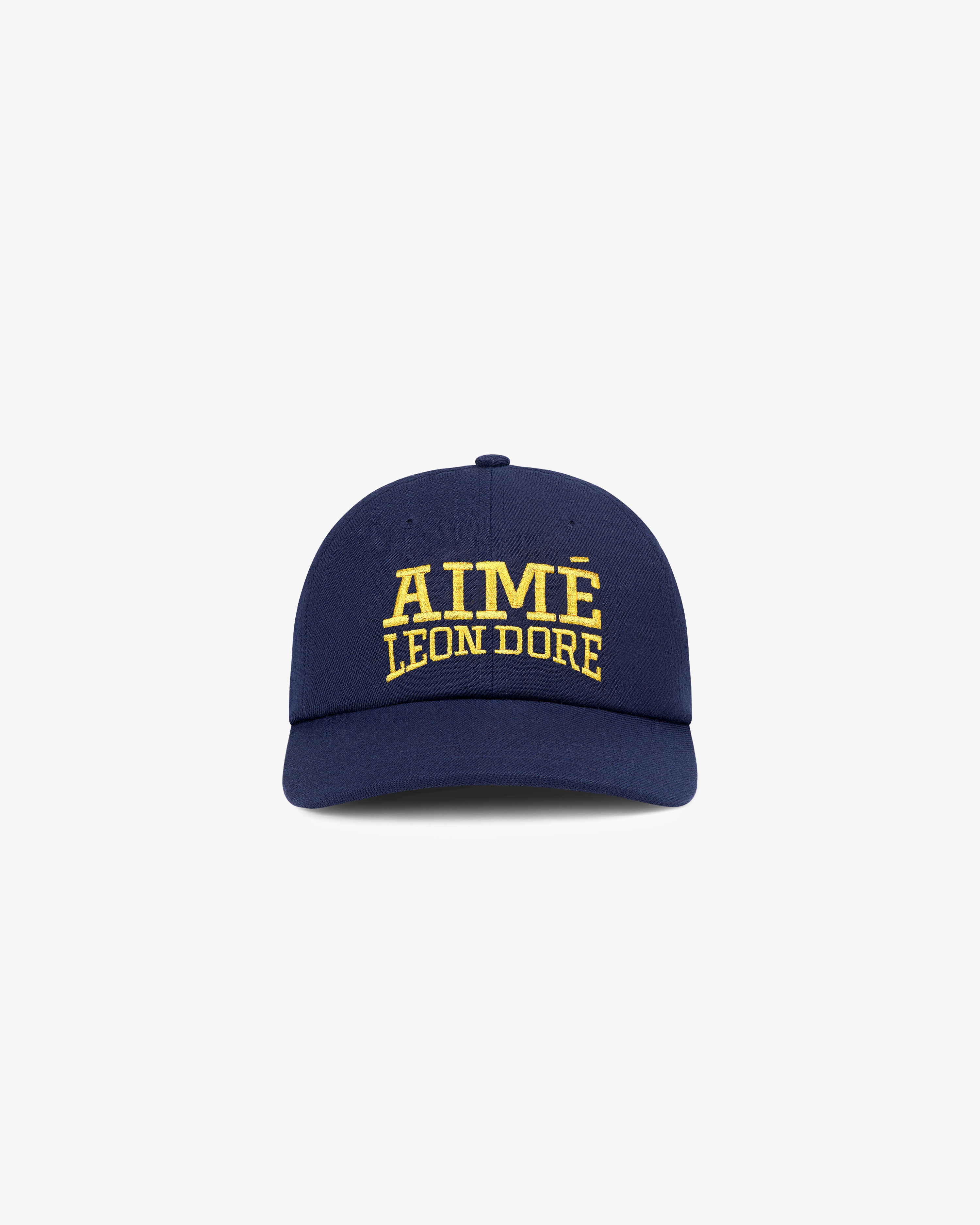 Aimé Campus Hat in navy with yellow AIMÉ LEON DORE embroidery on front, displayed against a white background.