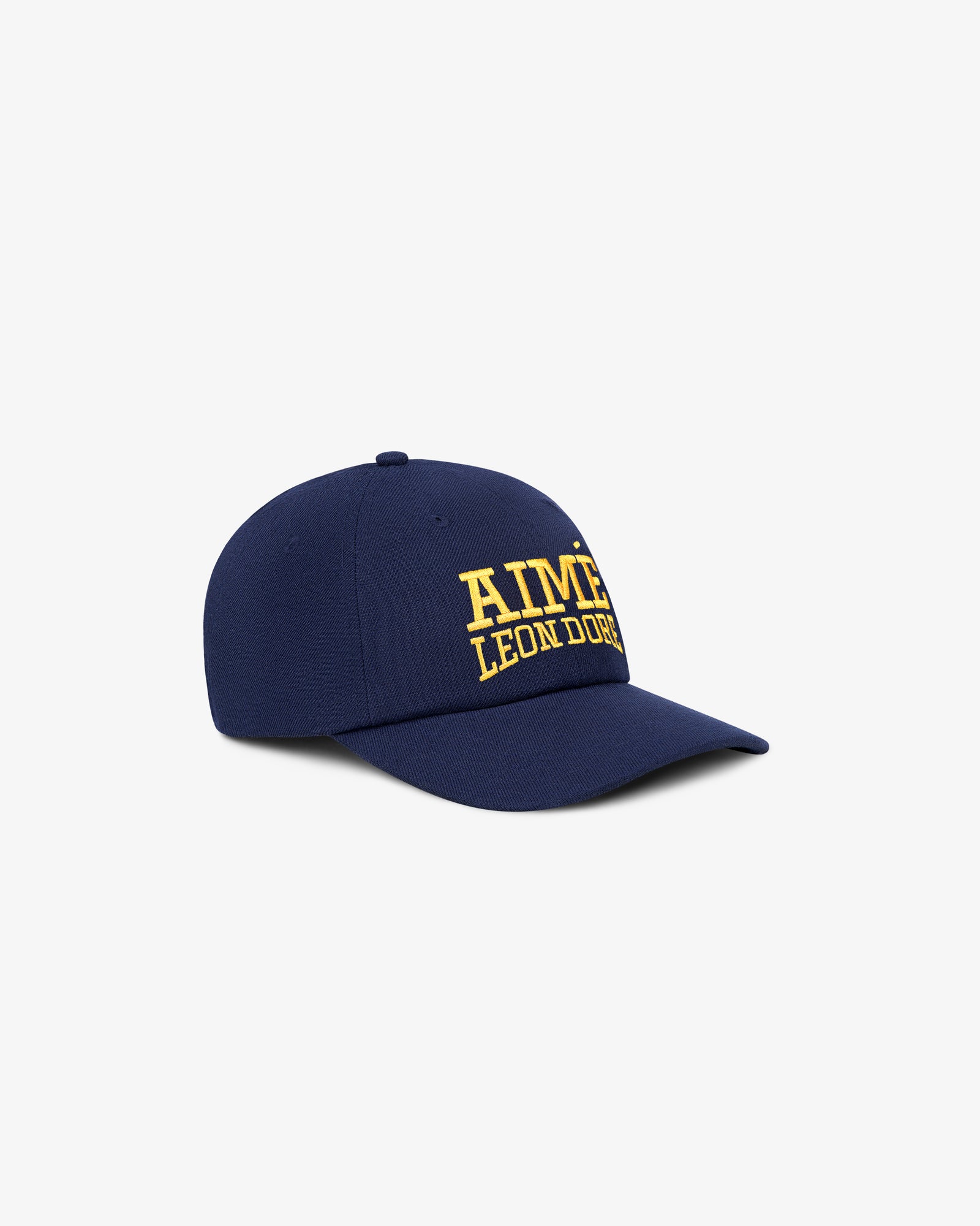 Navy Aimé Campus Hat featuring yellow AIMÉ LEON DORE embroidery on the front.