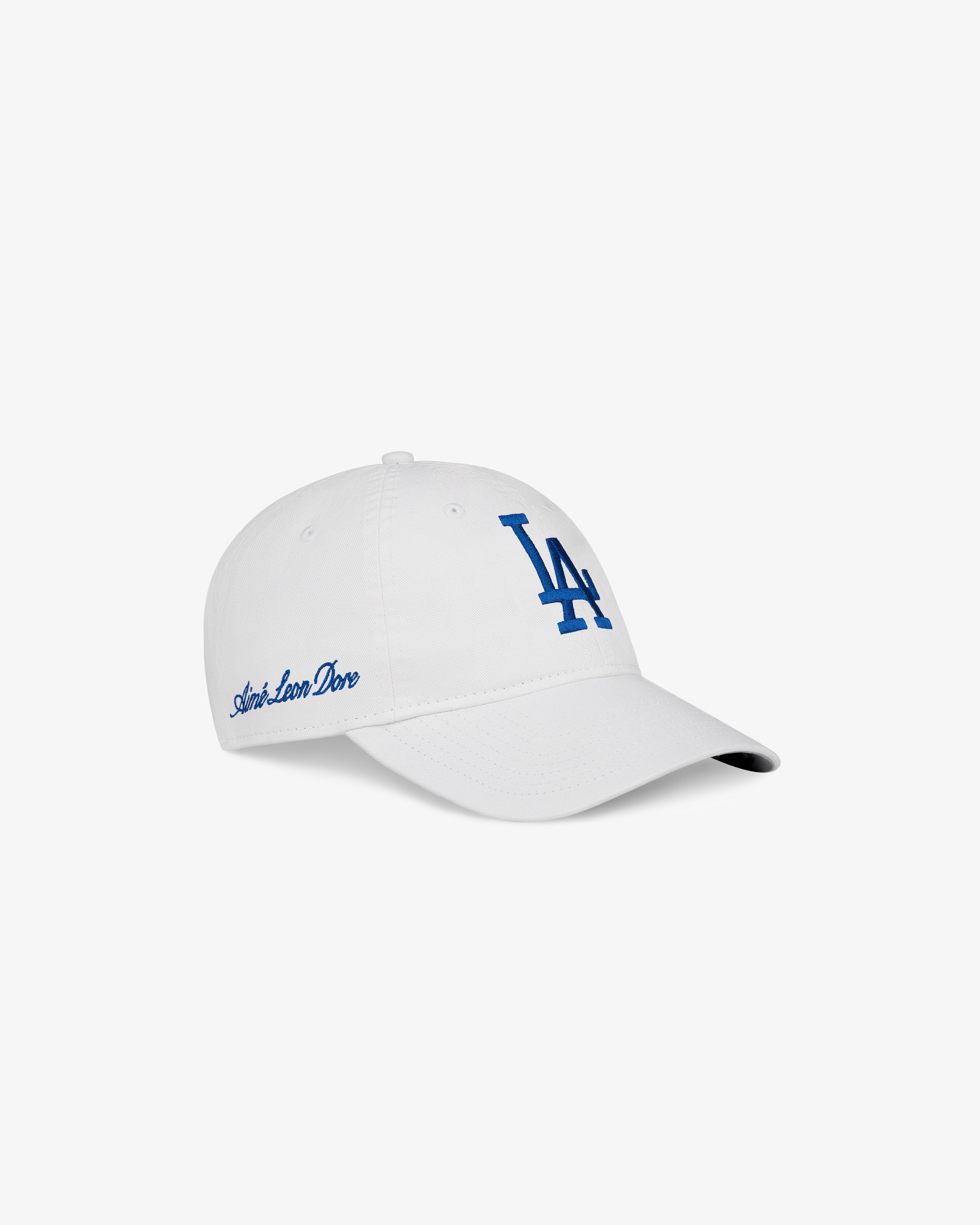 ALD / New Era Dodgers Ballpark Hat: white cap with blue LA initials and André Leon Dore script on the side.