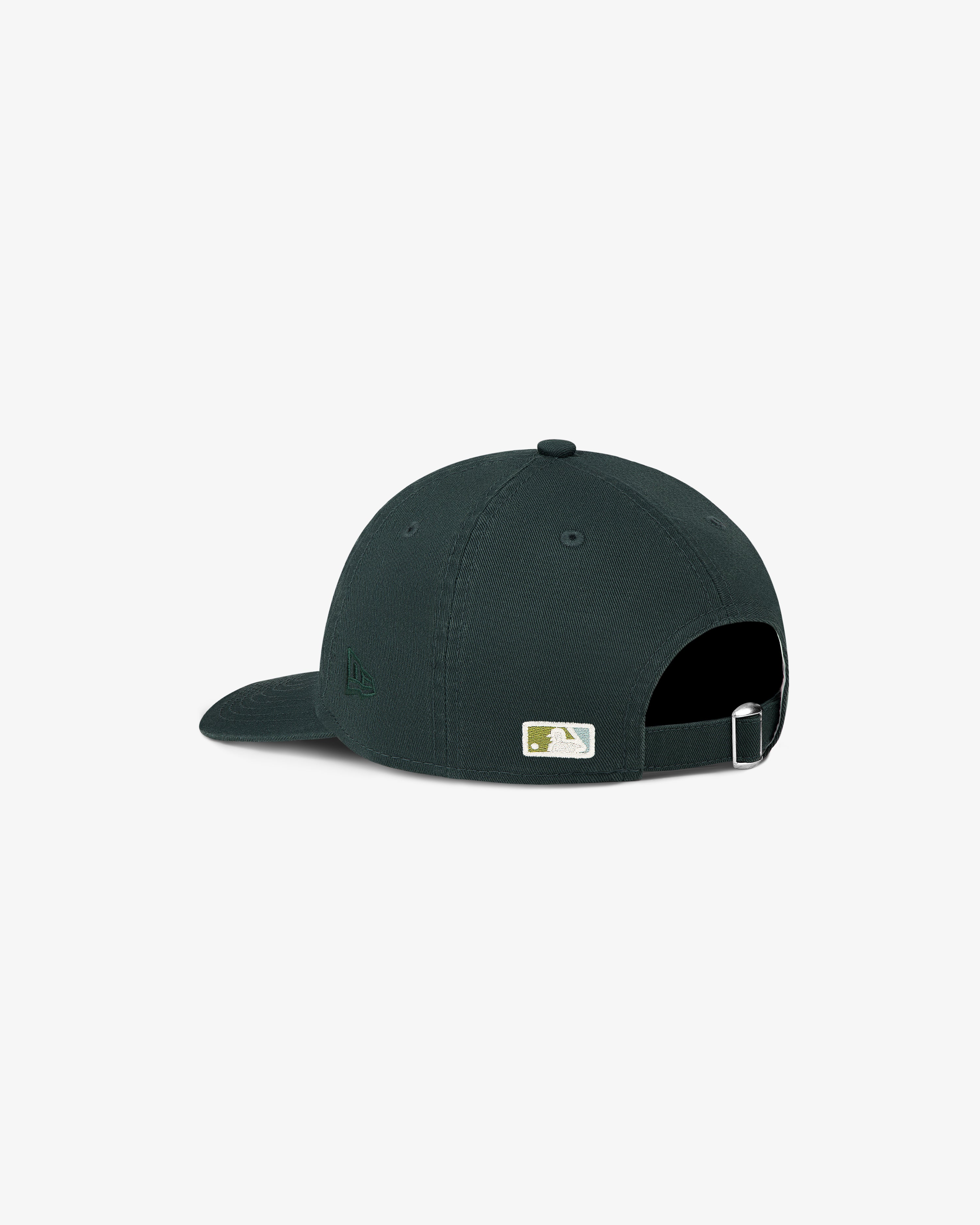 The ALD / New Era Dodgers Ballpark Hat in dark green features an adjustable strap and a small MLB logo on the back.
